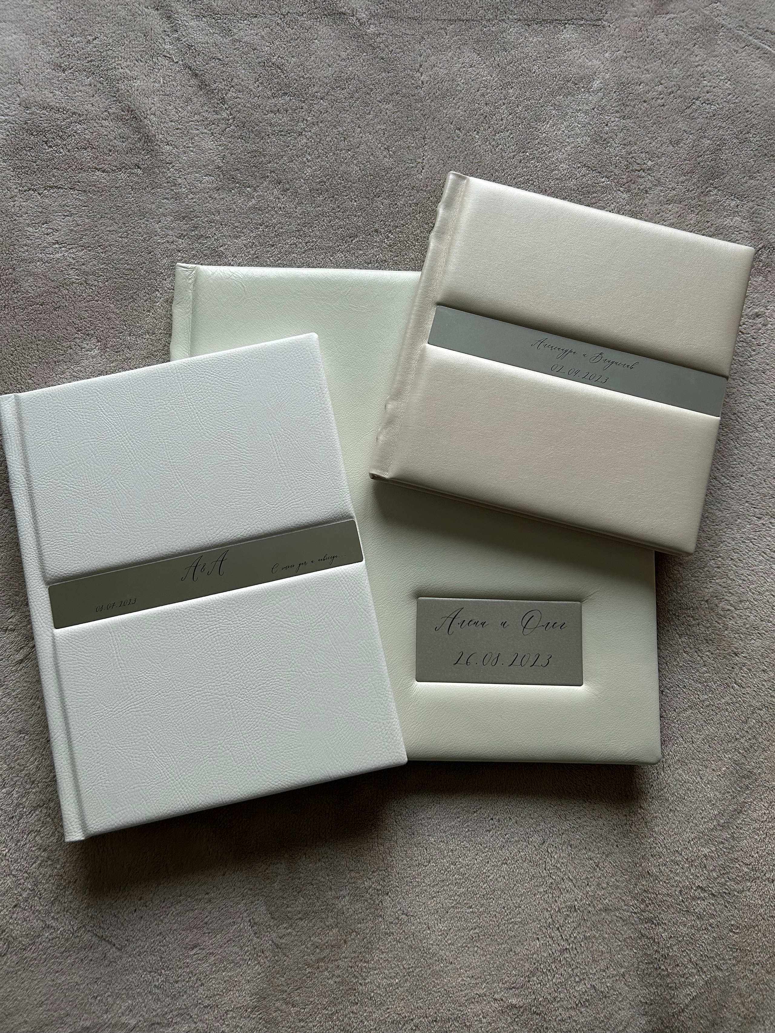 Свадебные фотокниги в искусственной и натуральной белой кожи с металлической вставкой