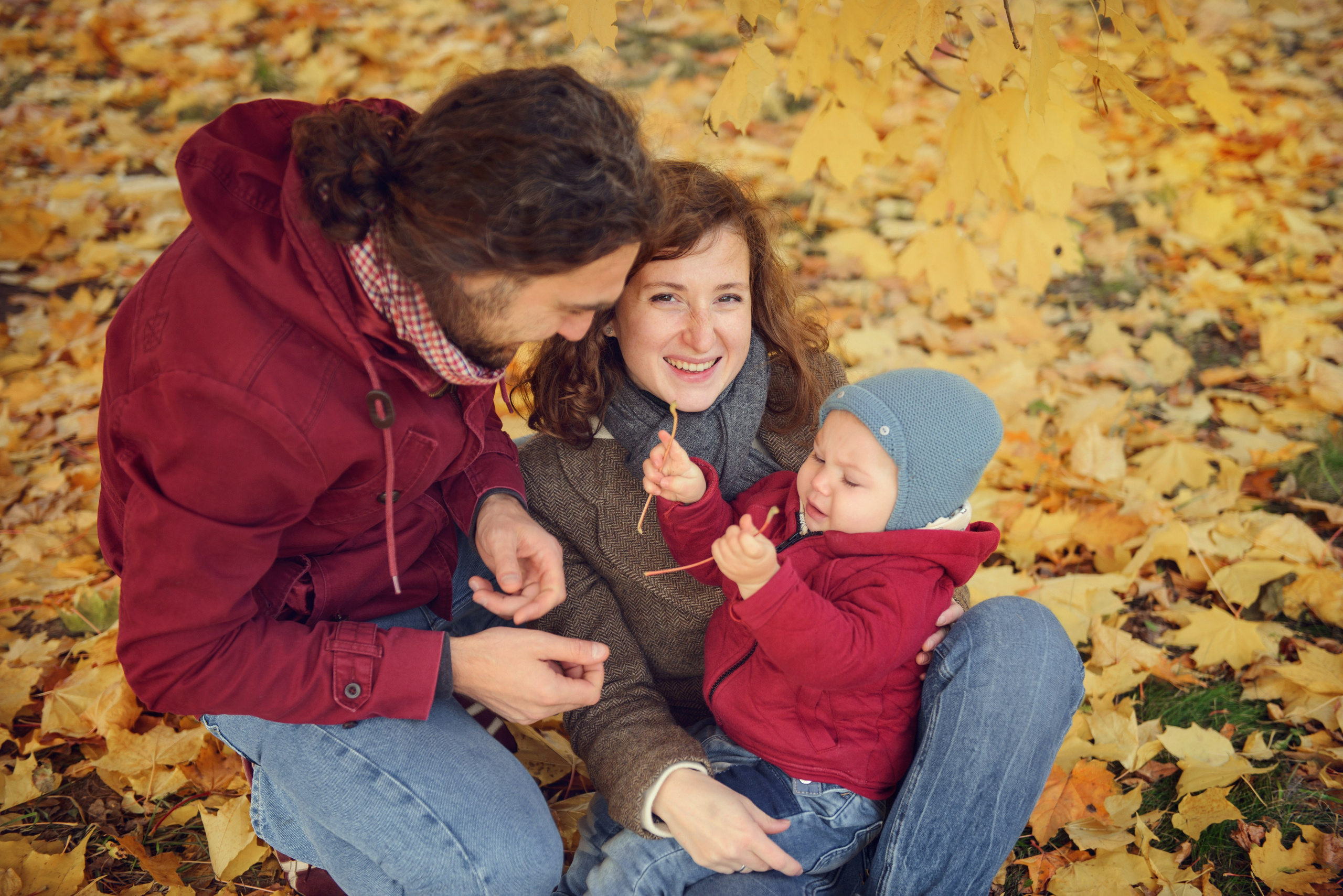 Family photo shoot in autumn. Photos with yellow leaves