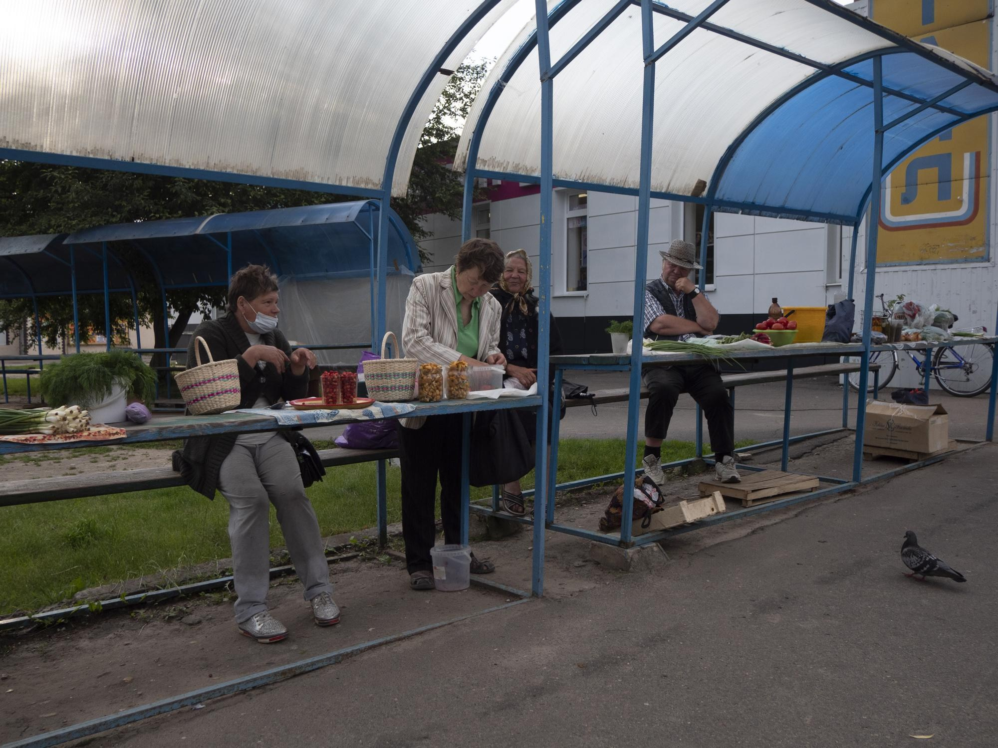 June 13, 2021, At the Novozybkov local market, city residents sell mushrooms, berries, and vegetables from their gardens. However, there are not many buyers. Even when serving vegetables at a party, many residents say, "Don't worry, these are products from another region."