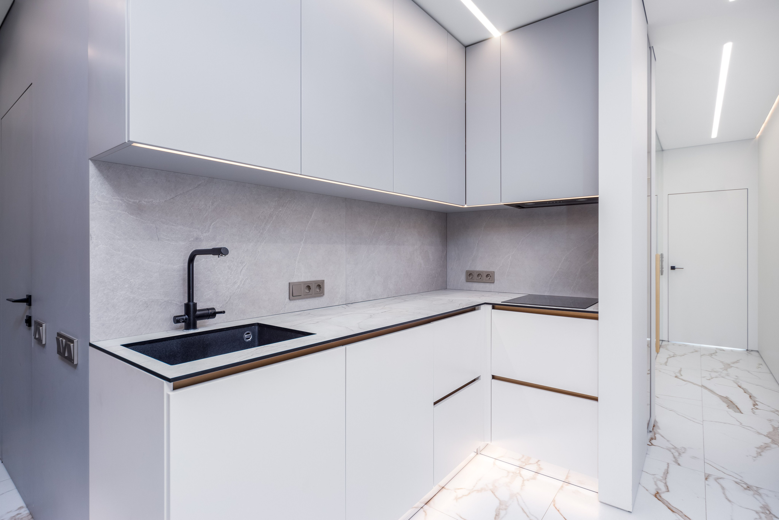 Фото интерьера зоны кухни в кухне-гостиной