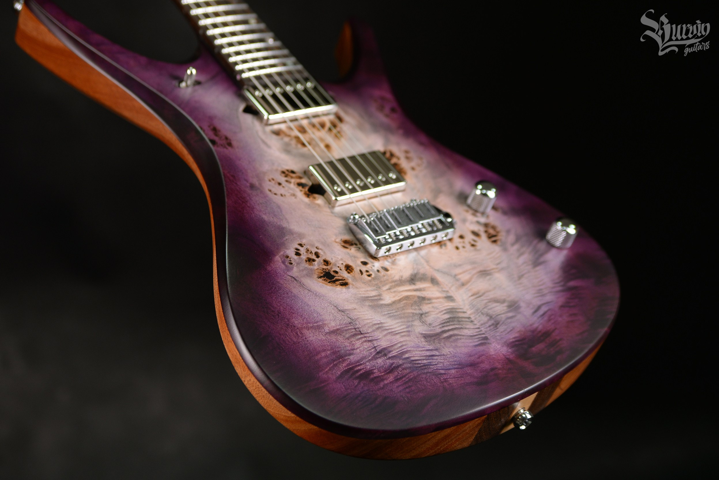 054 AXES. Master of making guitars and basses to order