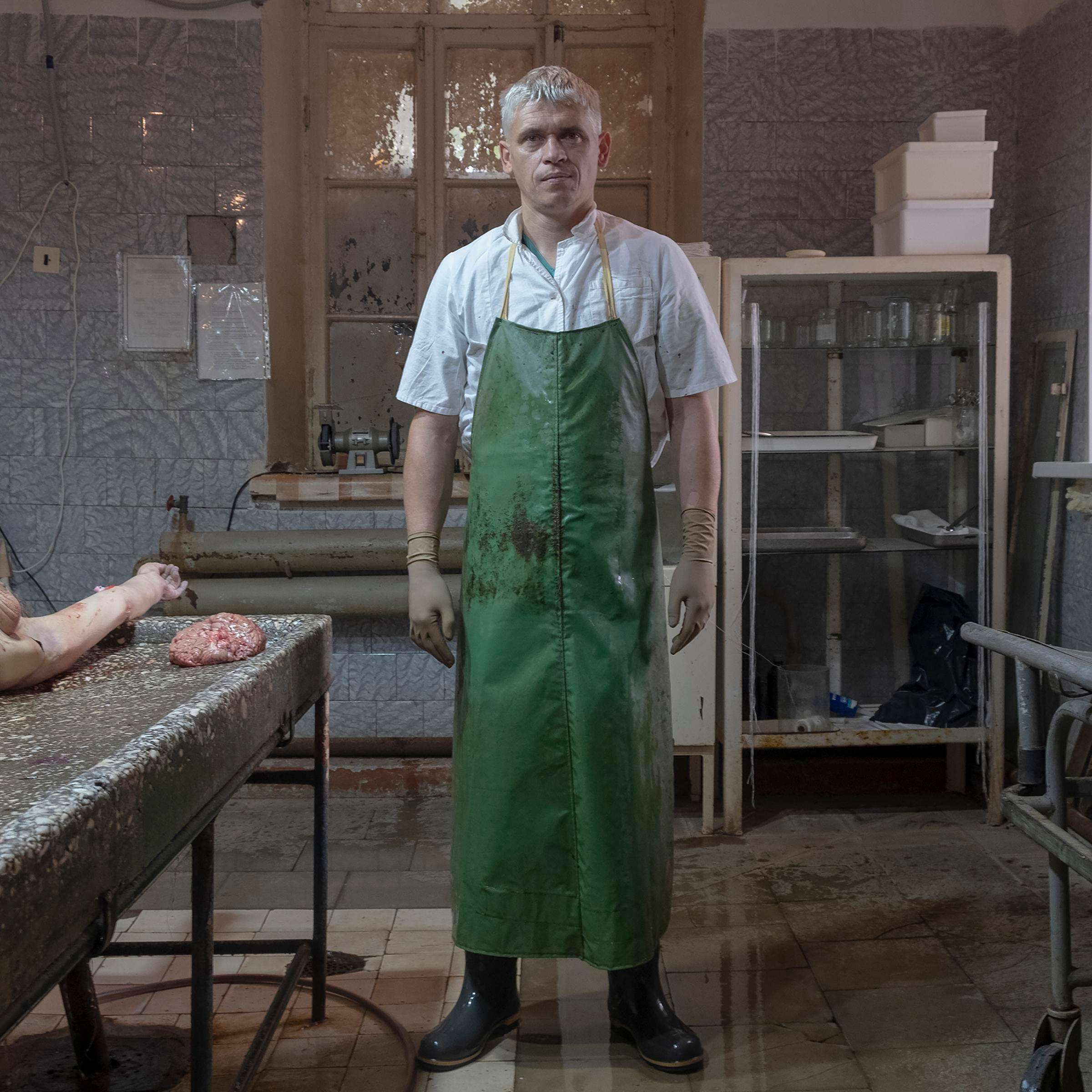 Pathologist in Pskov, Russia, after the autopsy of person with end-stage of HIV. He believes that his job is as normal as any other.