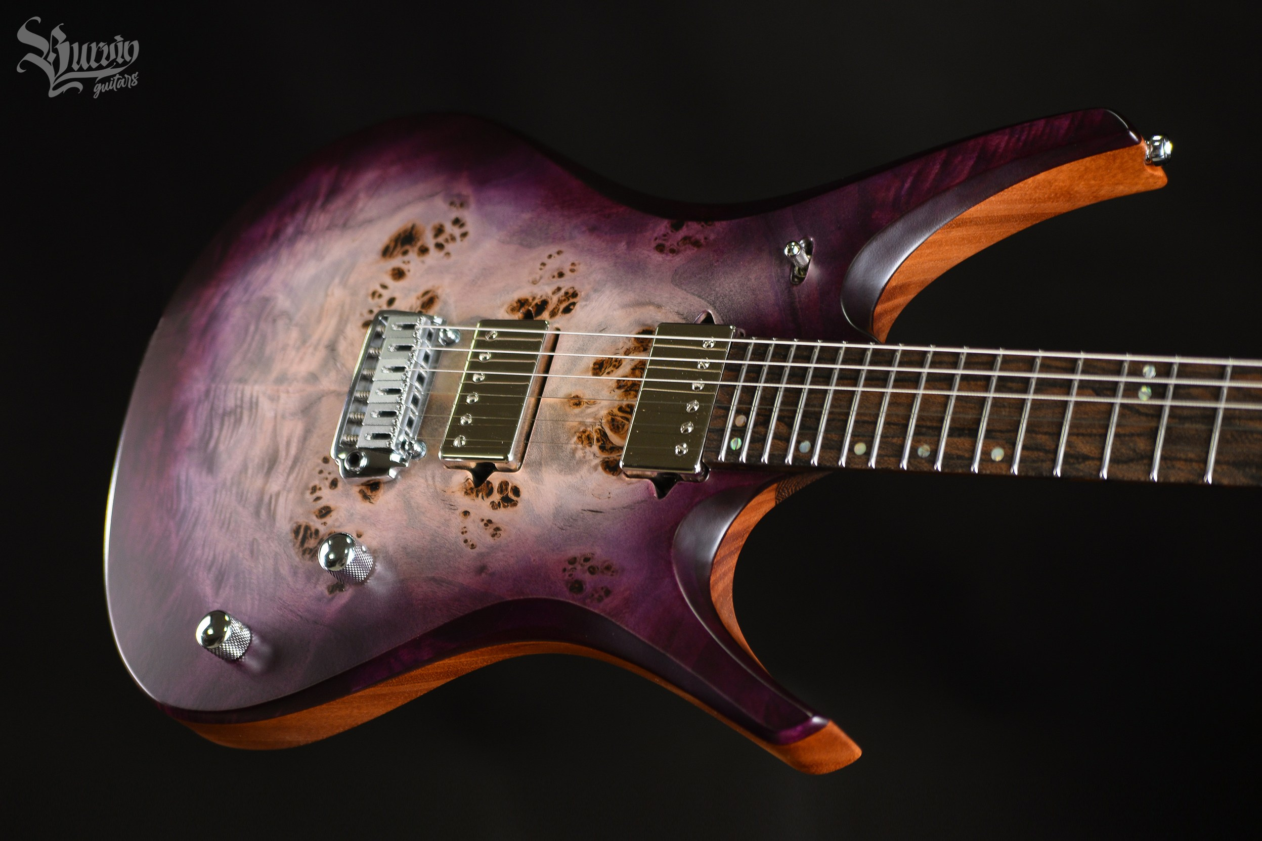 054 AXES. Master of making guitars and basses to order