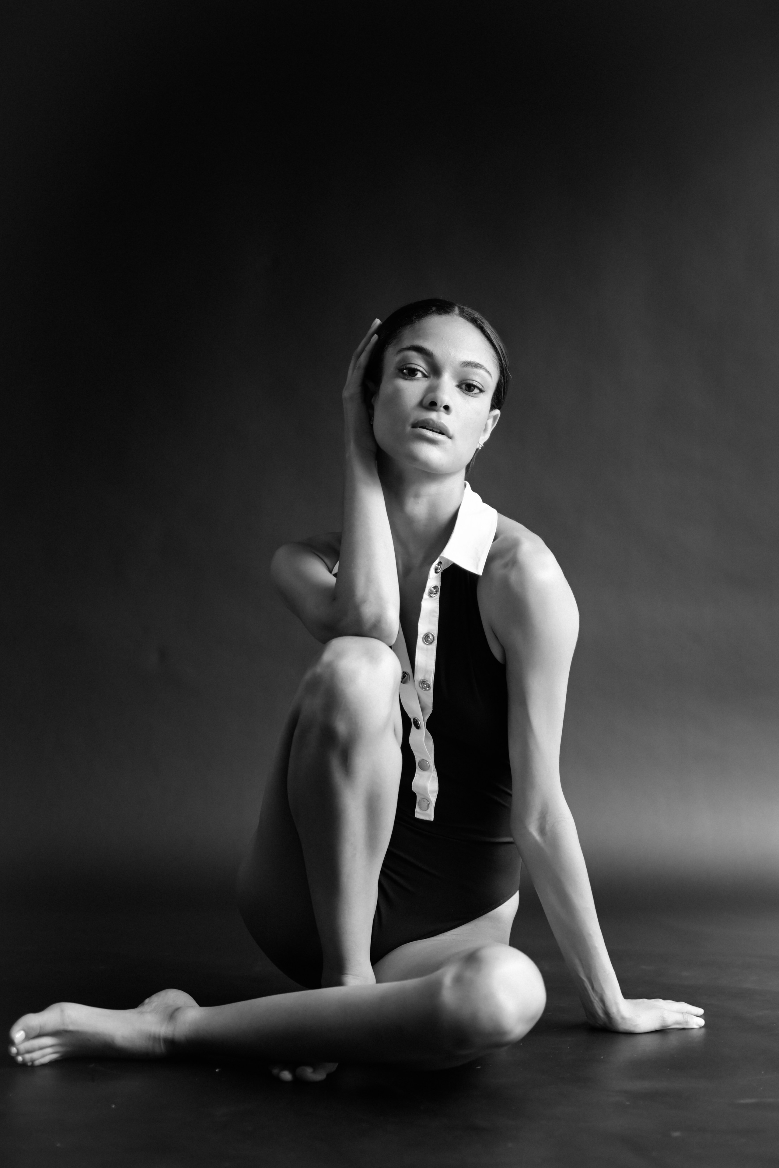 model test photoshoot - female model seated in the london studio