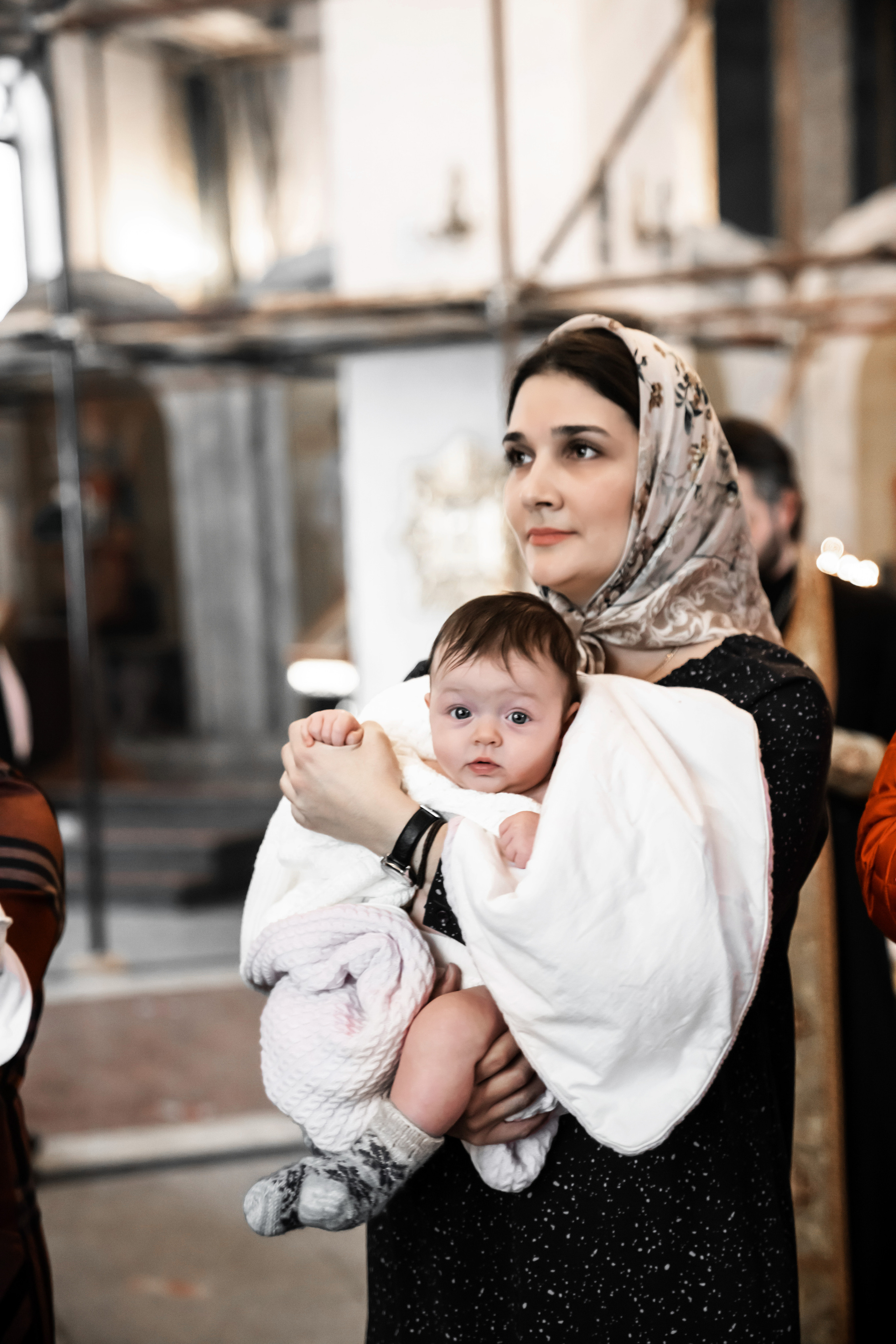 Таинство крещения. Фотограф Евгений Опарин