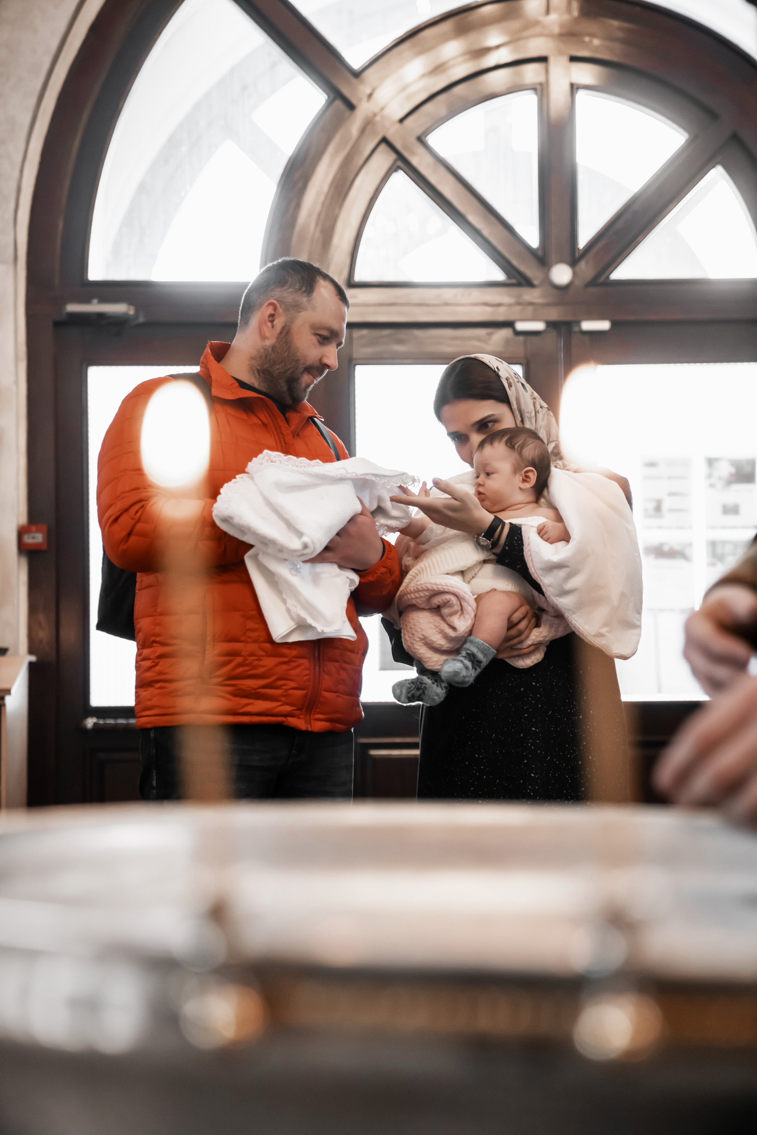 Таинство крещения. Фотограф Евгений Опарин