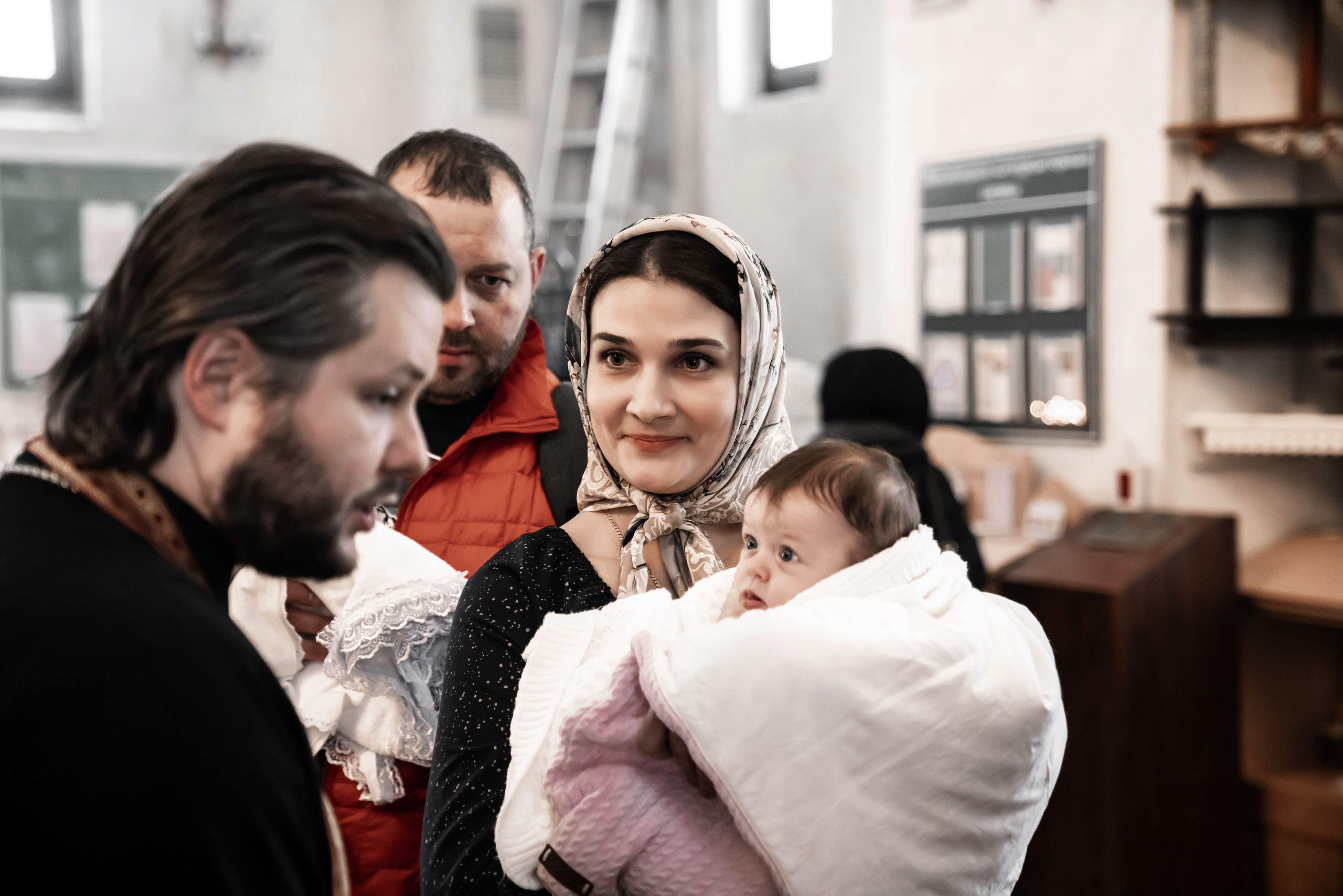 Таинство крещения. Фотограф Евгений Опарин