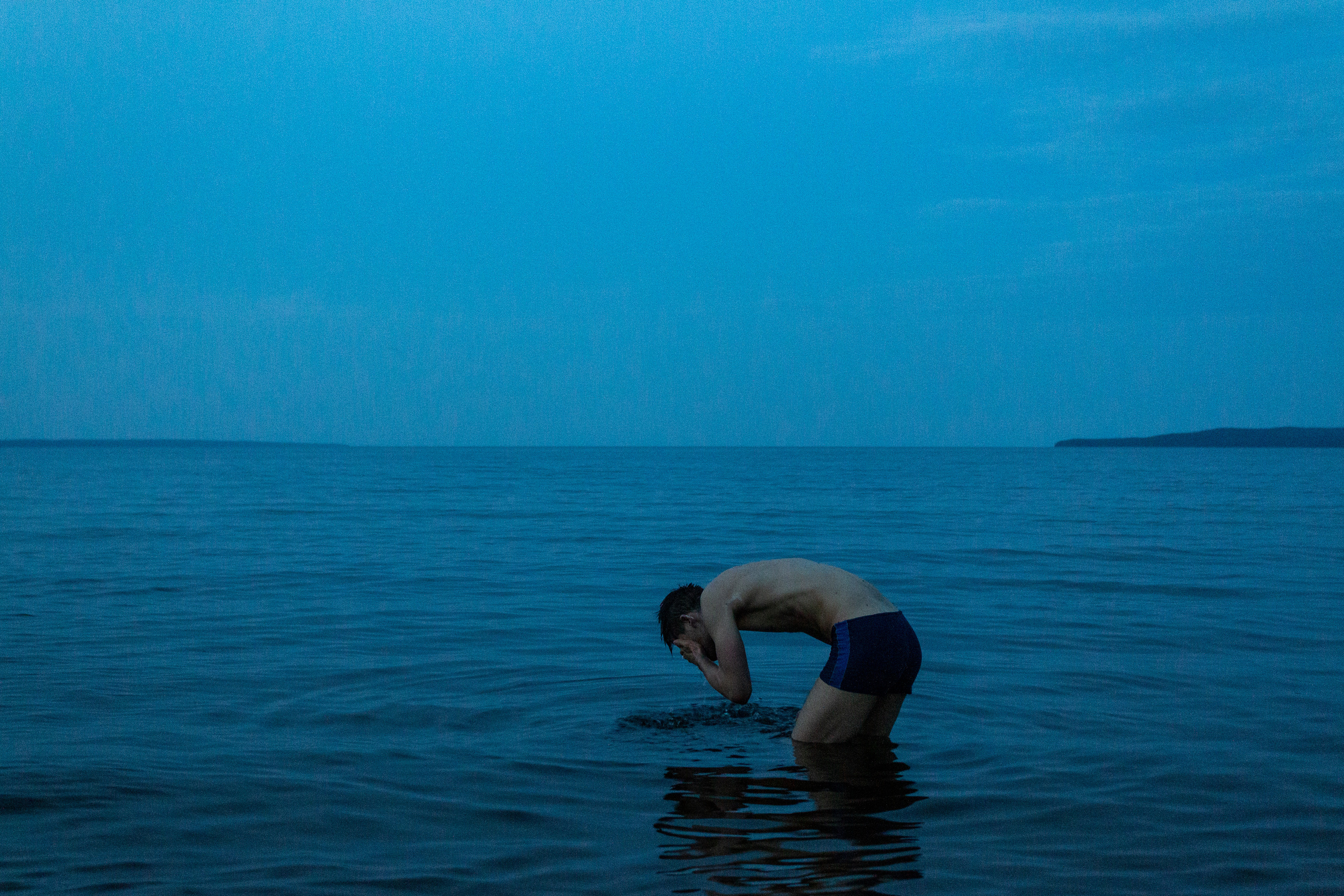 Roma washing himself in the Lake Onega.
