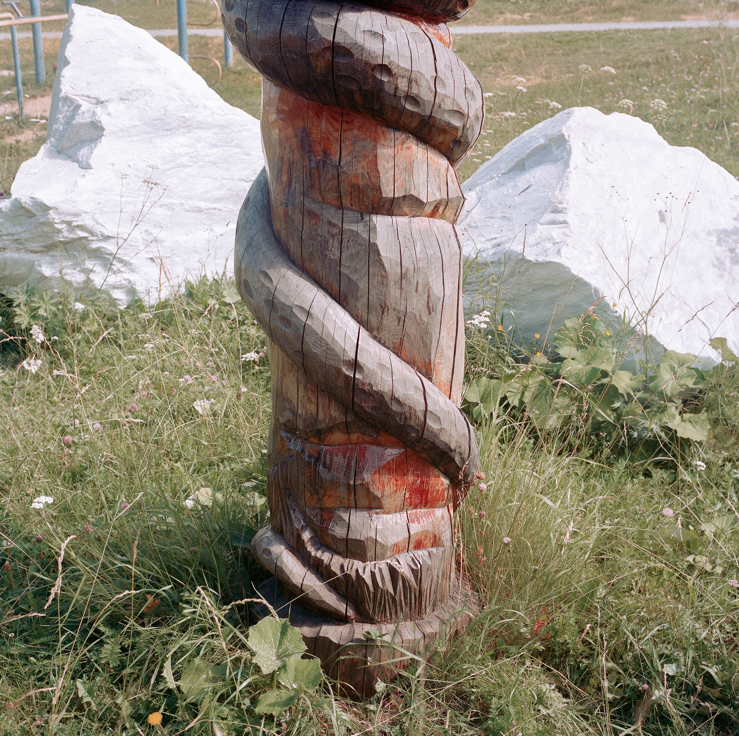 A wooden idol based on the tales of Bazhov in the city of Polevskoy, Sverdlovsk region, where the writer lived for some time. Historically, the Urals was a place of paganism. In some tales, the writer uses the expression "old people”. This refers to one of the indigenous peoples of the Urals, the Vogul (Mansi), who believed that the spirits of their ancestors lived in the caves of the Azov Mountains. Even after the arrival of Russian settlers in the Urals and the construction of the Polevskoy plant, the Voguls did not forget their sacred place and came to the top of Azov Mountain to worship the souls of their dead ancestors. After reading the tales of Bazhov, local children wanted to find the treasures of Azov-Mountain. In 1940, metal and bronze objects were found at the top of the mountain, among which the most valuable were bird-shaped idols.