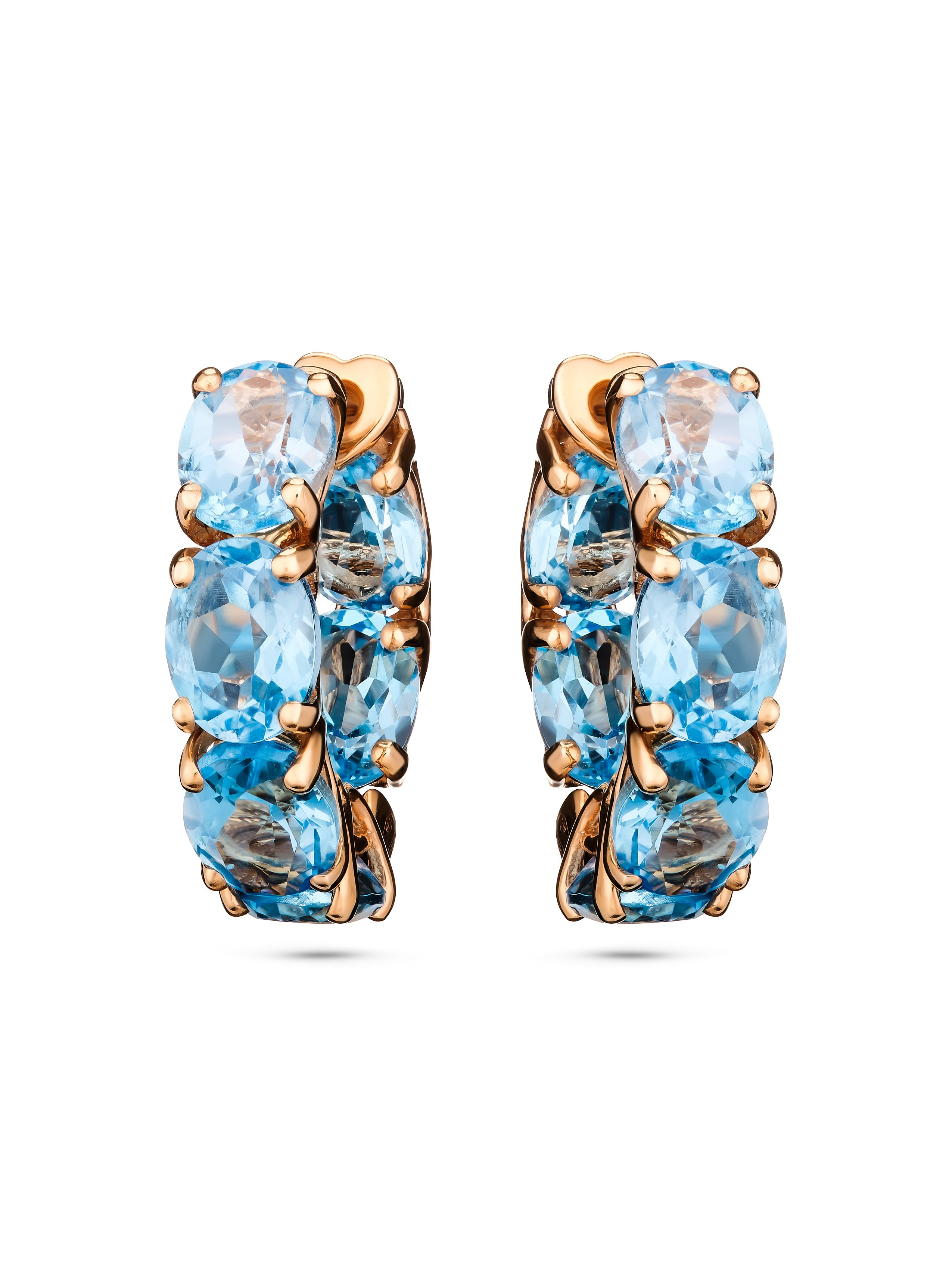 Серьги Damiani с крупными голубыми камнями в золотом корпусе