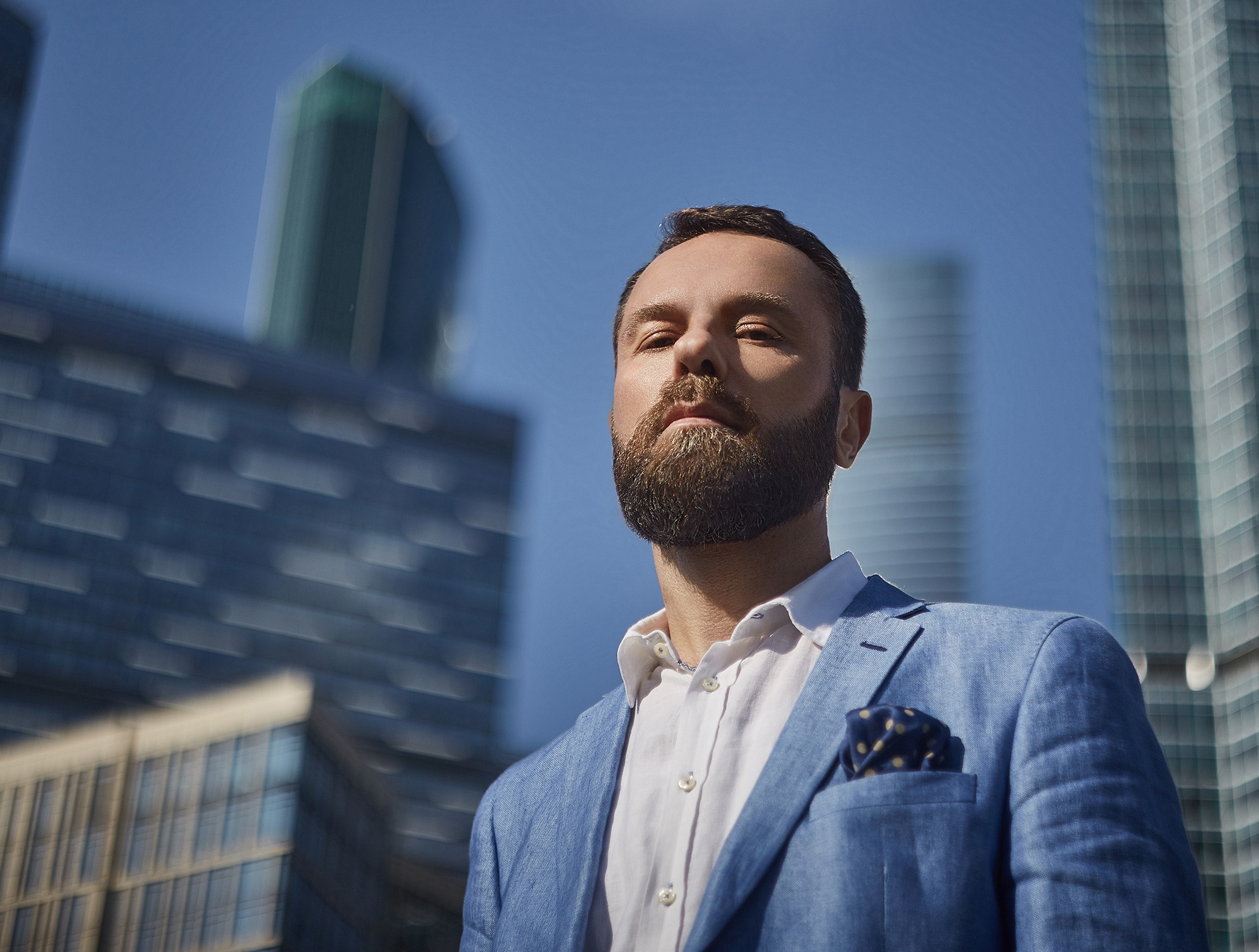 Business portrait on the background of the city of Moscow