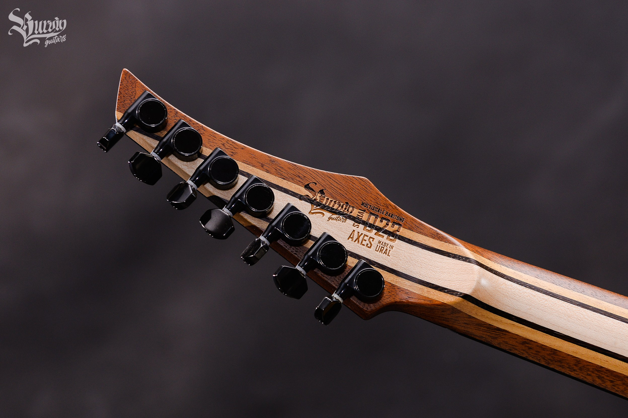 023 AXES. Master of making guitars and basses to order