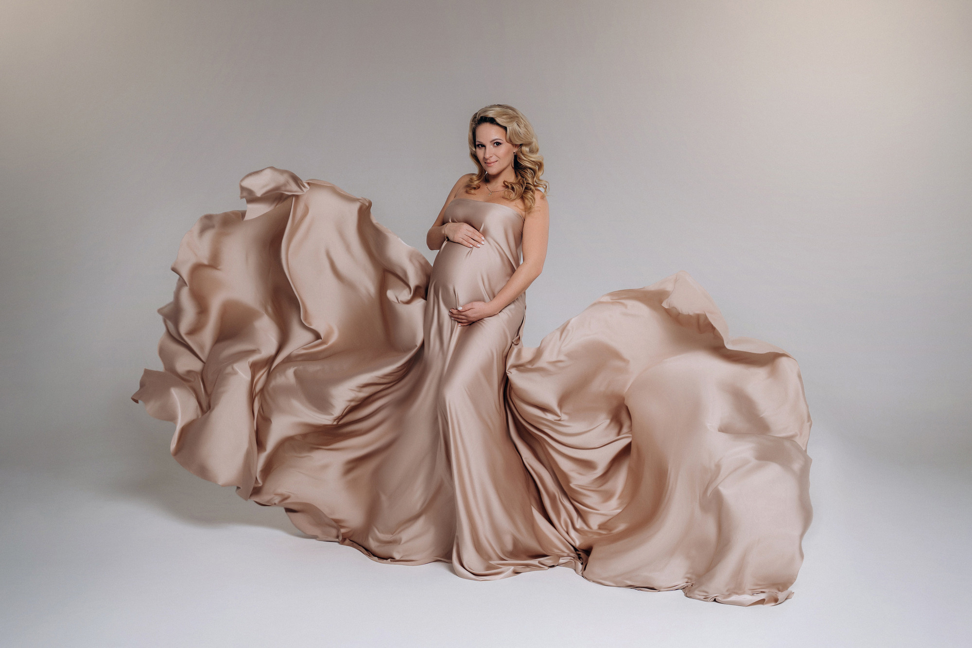 лучший фотограф беременности