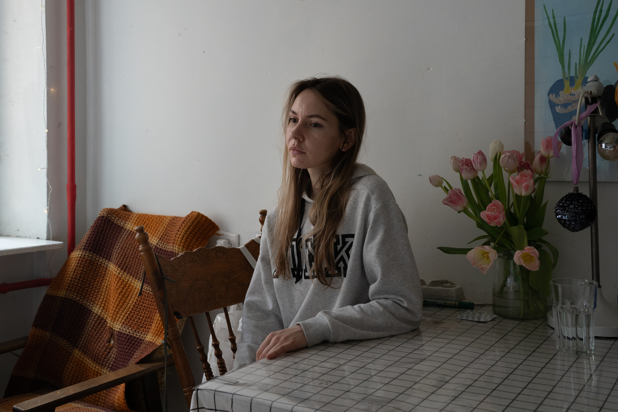 Elena, the fiancee of Pavel Krisevich, who was sentenced to 5 years for a political action in Moscow, in the kitchen of his apartment. Pavel is an activist, artist and author of performances dedicated to political prisoners. On June 11, 2021, Pavel went to the Red Square in Moscow, delivered a manifesto against the police state. He fired Makarov's deactivated pistol twice into the air, and then simulated a shot to his head and fell. Pavel was prosecuted for “hooliganism”, and on October 8, 2022, the Tverskoy District Court of Moscow sentenced him to five years in a penal colony.