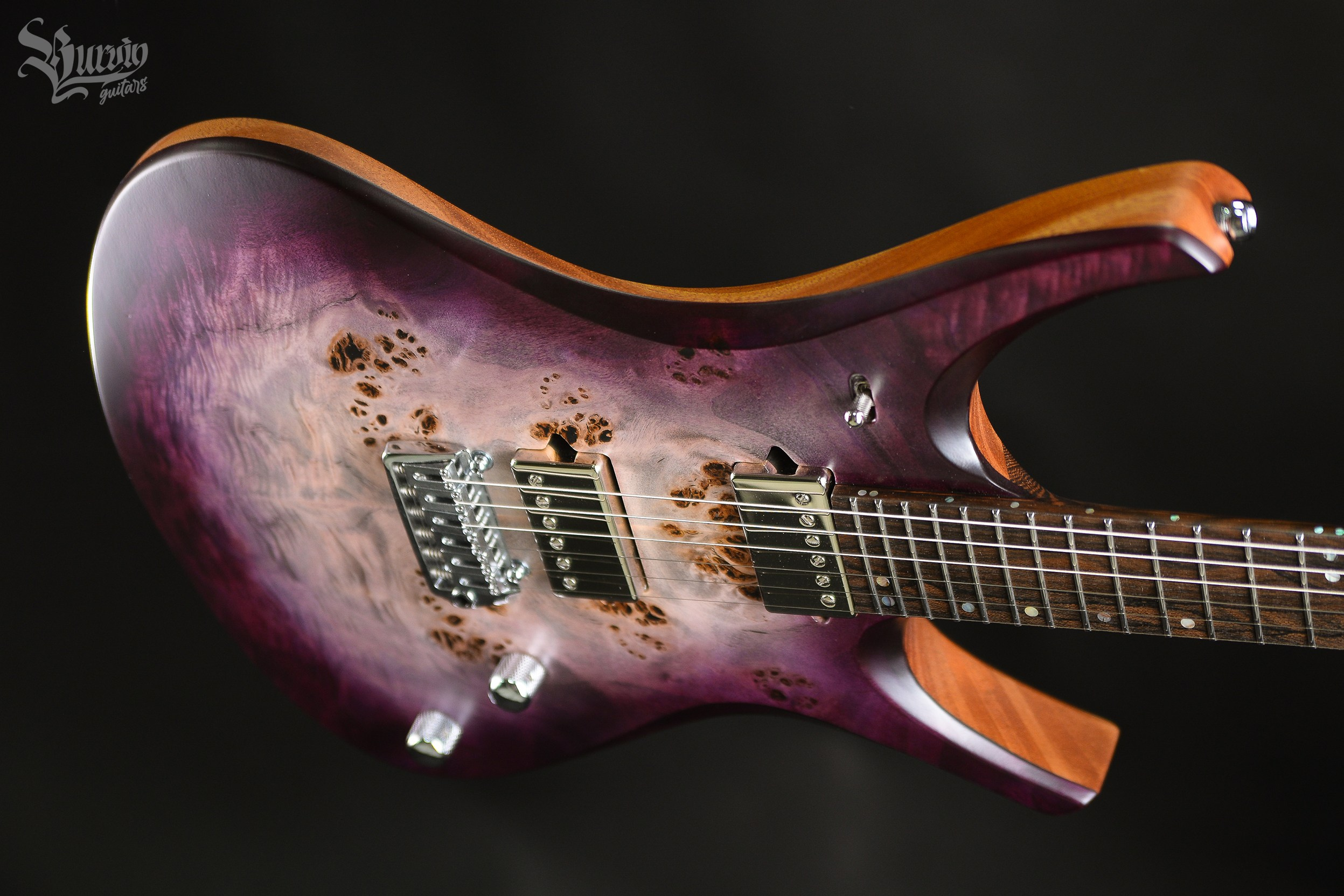 054 AXES. Master of making guitars and basses to order