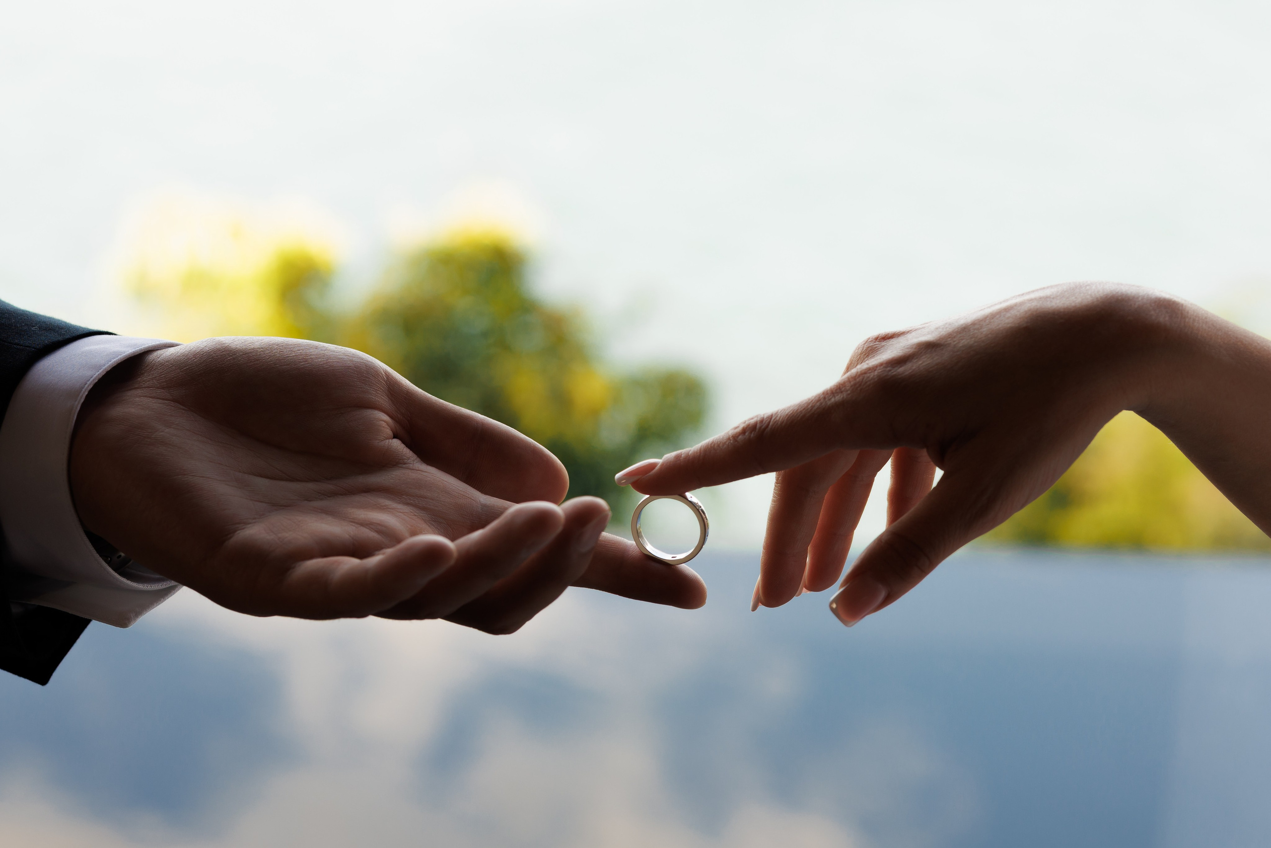 close-up of the hands of the bride and groom