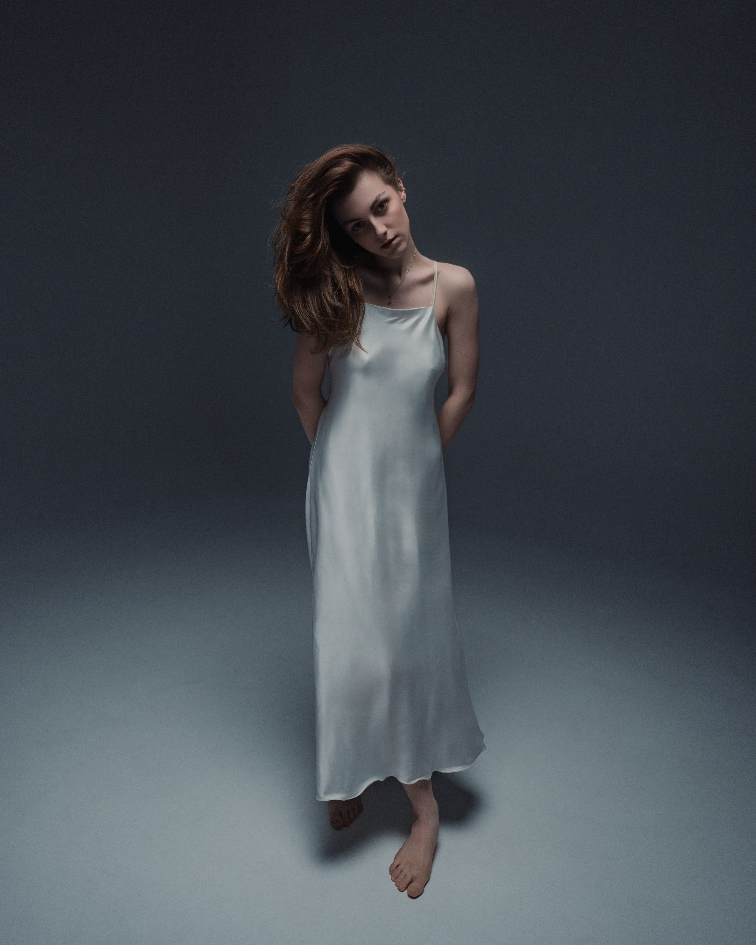 Women’s portrait photoshoot in a professional studio with natural lighting