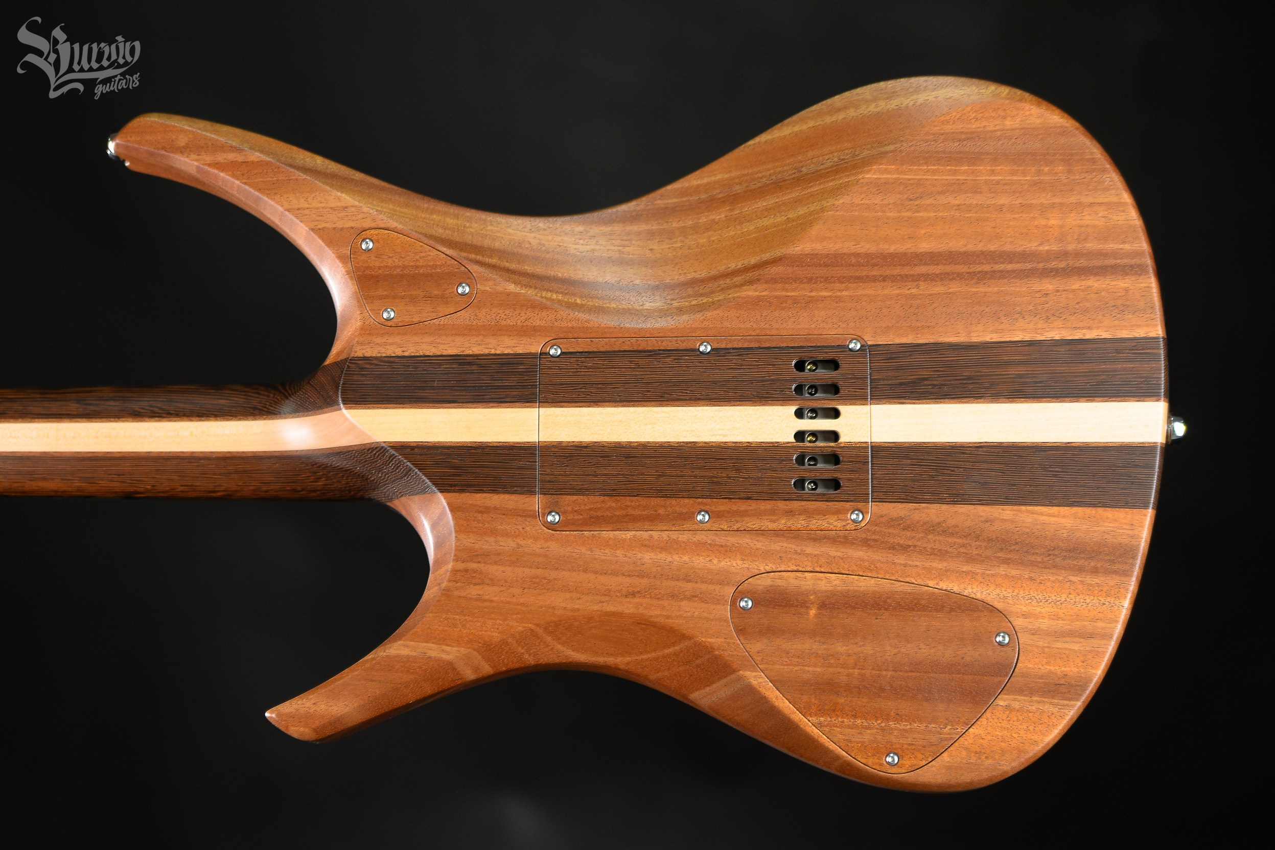 054 AXES. Master of making guitars and basses to order