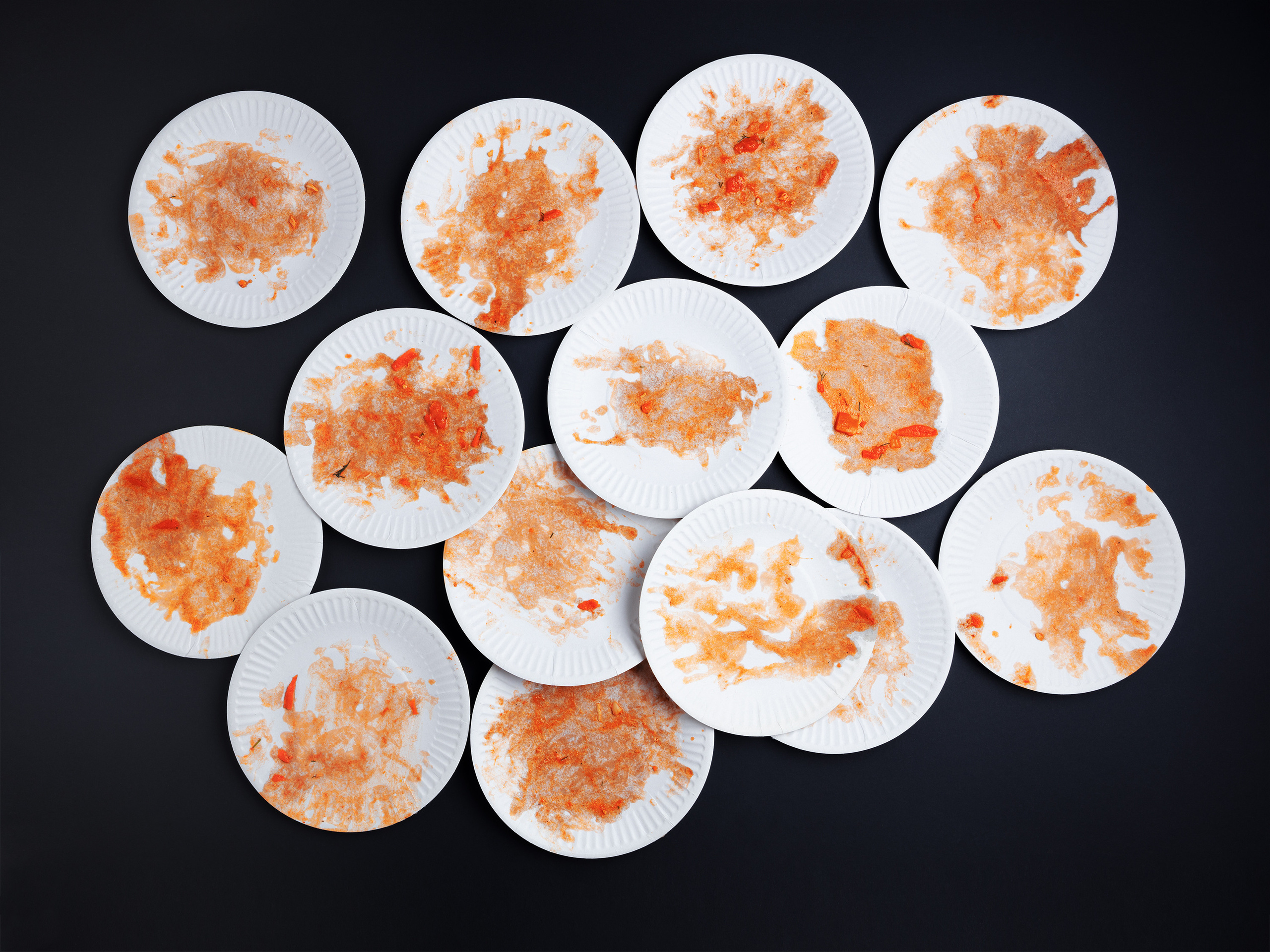 Used paper plates after soup kitchen. There was pasta with pulled pork