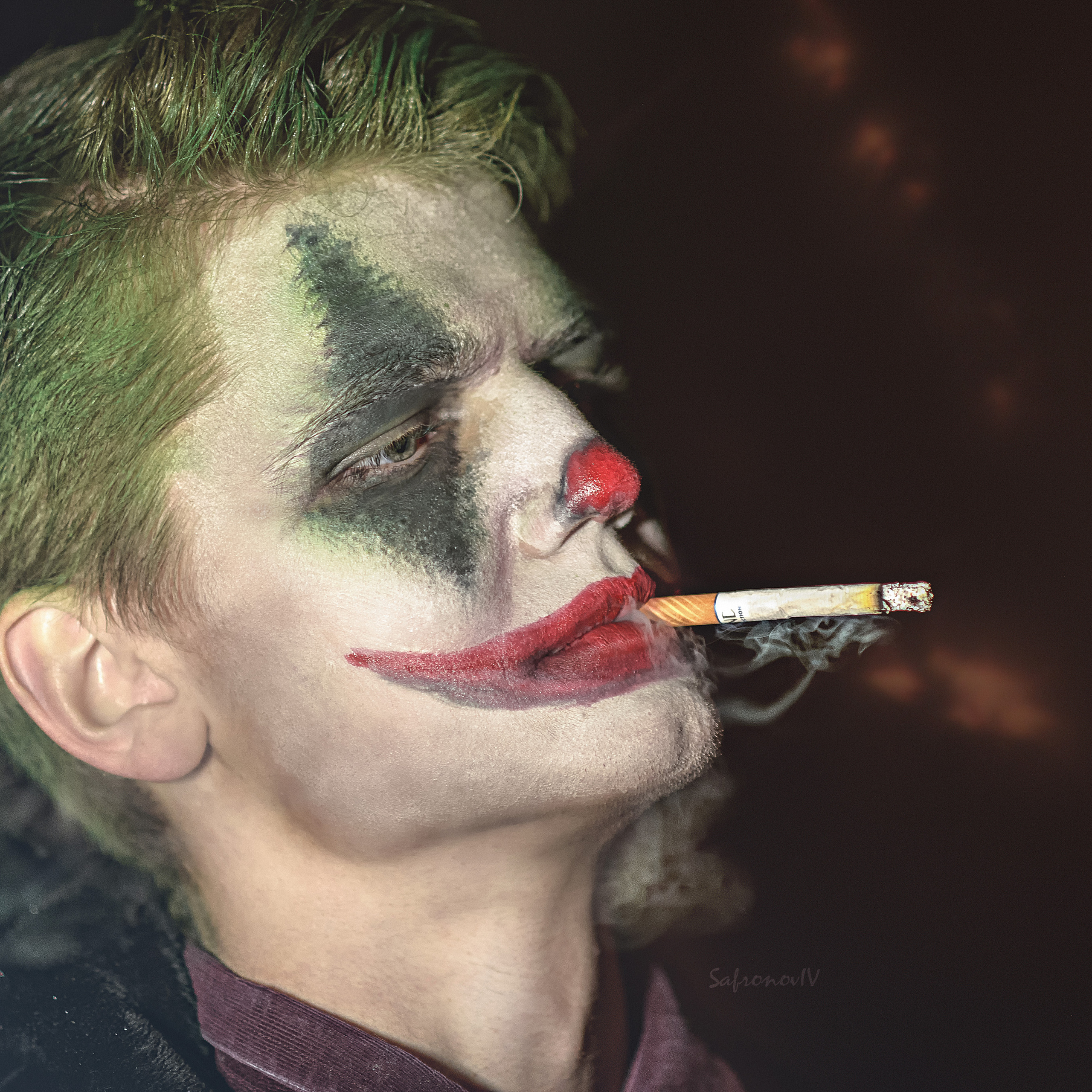 Портрет курящего Джокера