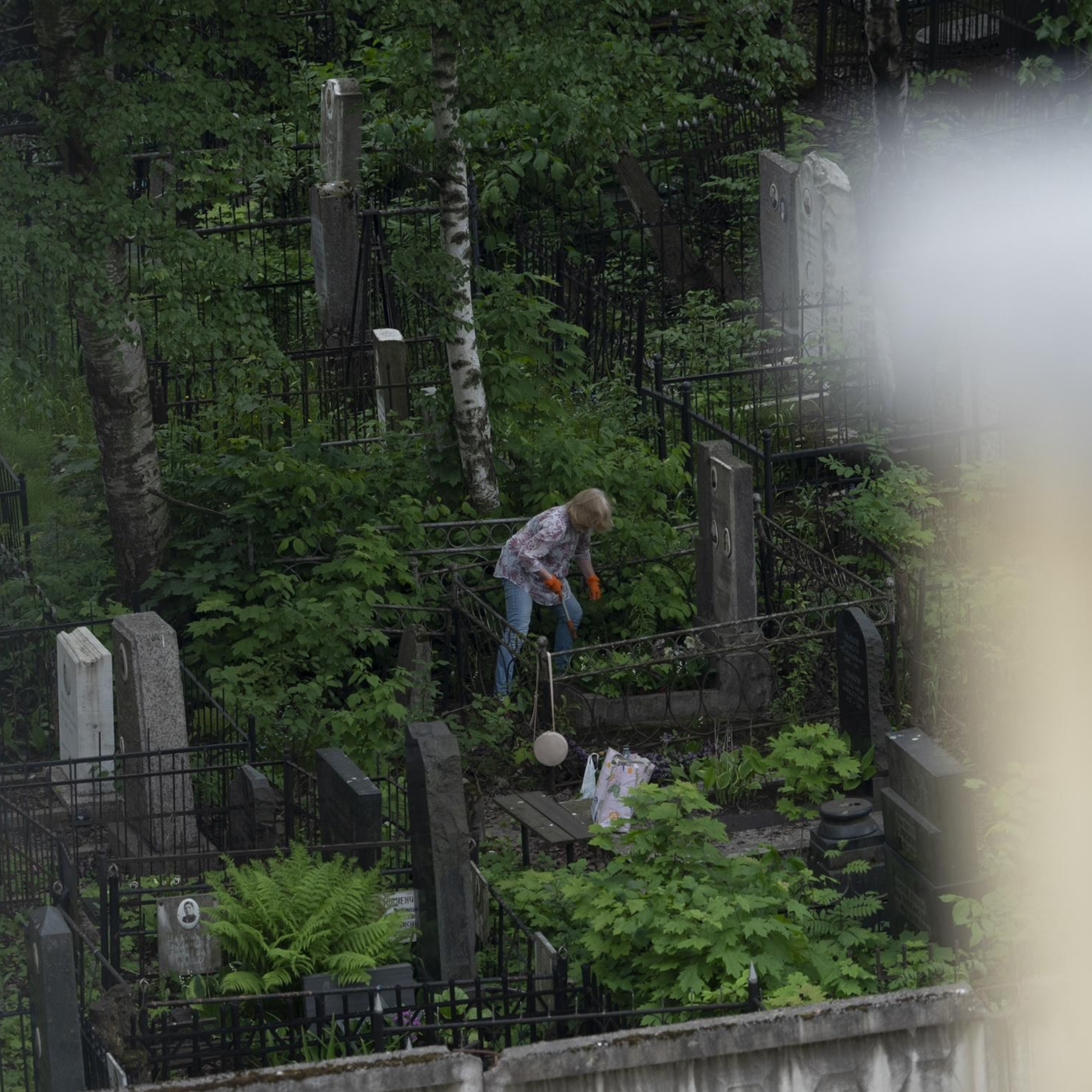 June 9, 2020, The woman came to clean her relatives' grave in the old Jewish cemetery after the authorities allowed visits to cemeteries and several other places.