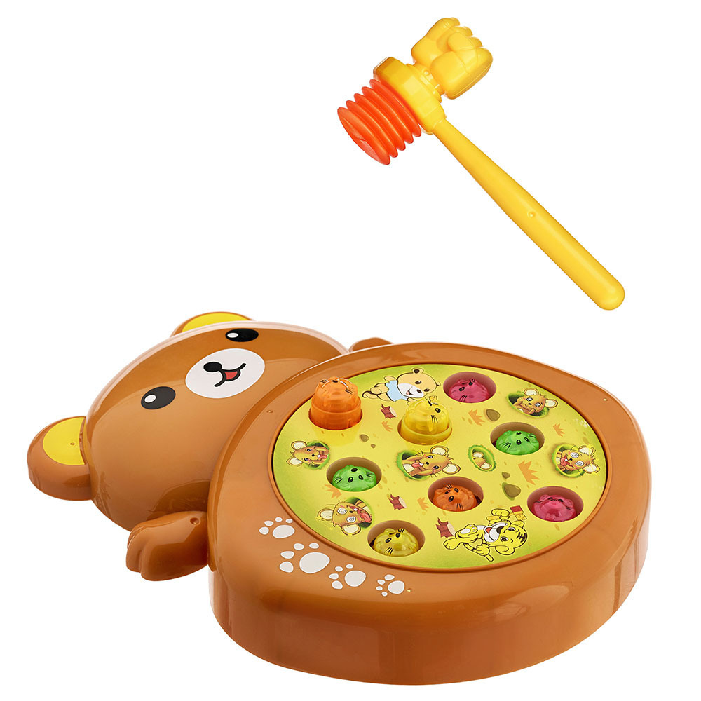 Детская музыкальная игрушка пластмассовый медвежонок с молоточком  на белом фоне