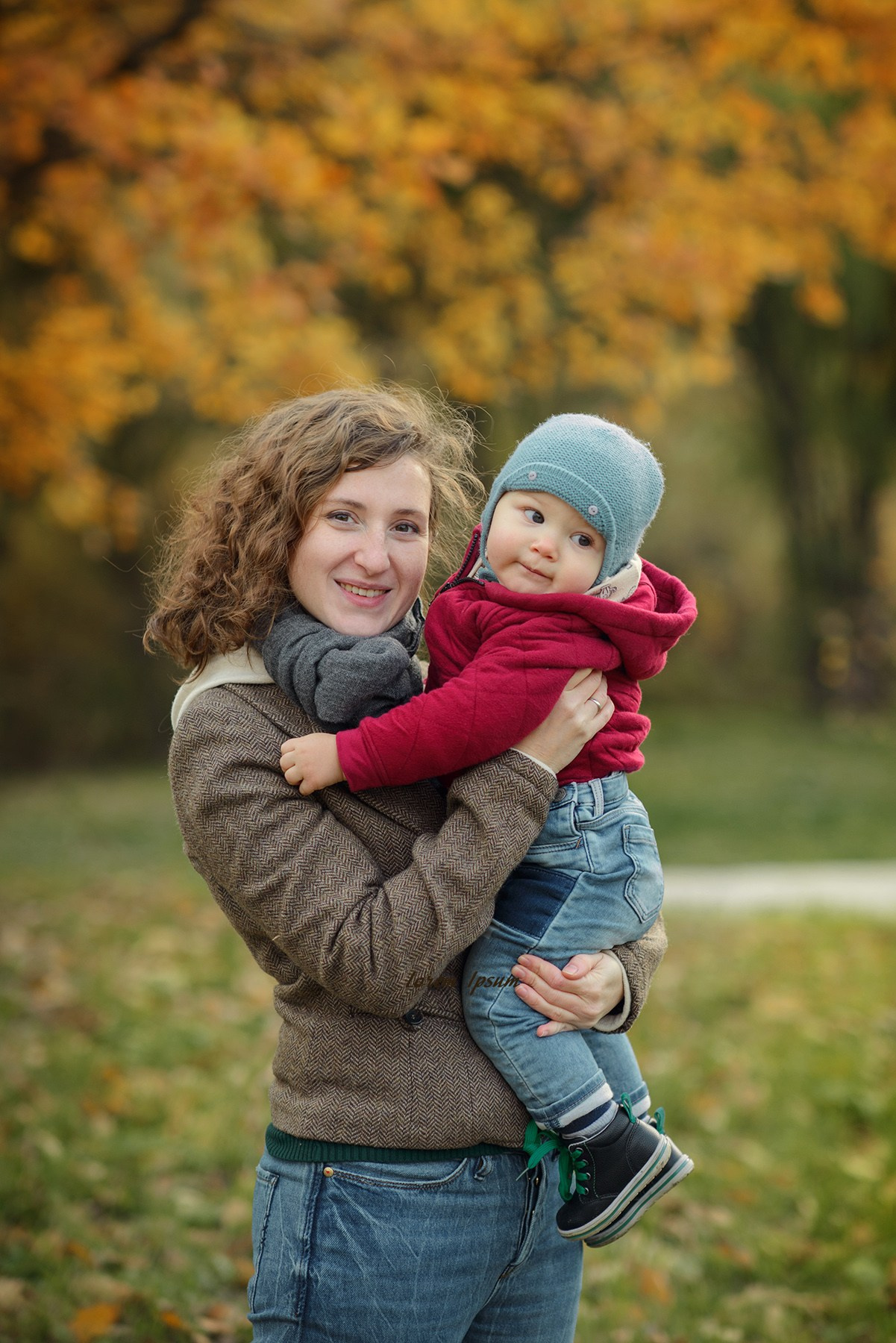 Photo shoot of a mom with baby in autumn. Photos with yellow leaves