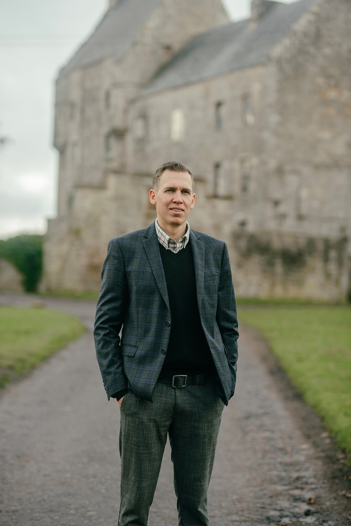 man in Scotland, photo shoot at the castle