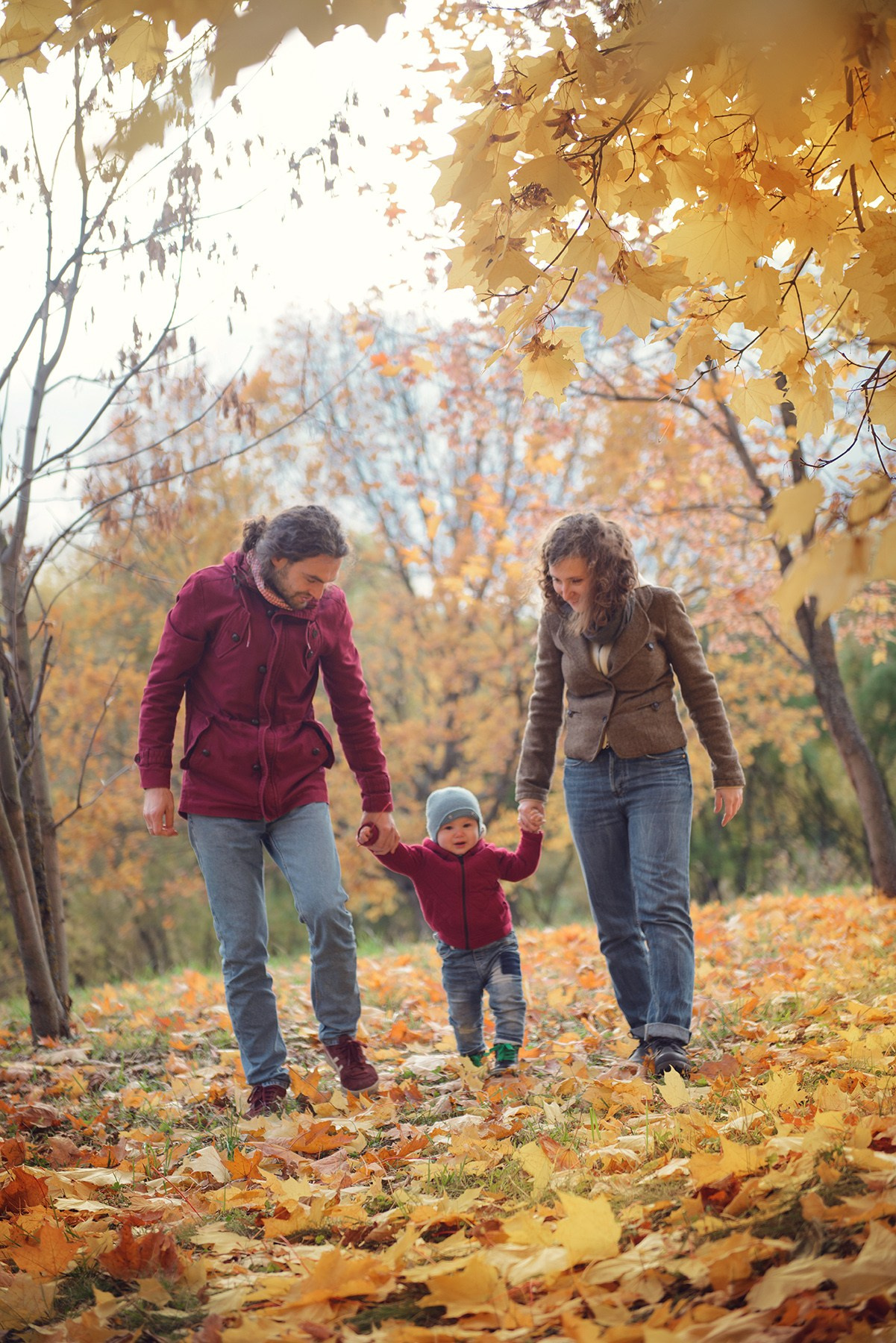Family photo shoot in autumn. Photos with yellow leaves