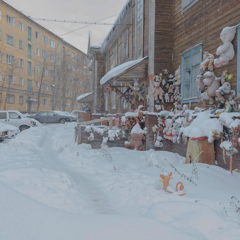 Some people are still living in wooden huts here.
