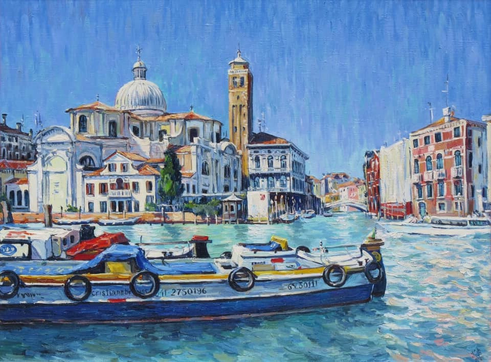 A cargo barge in front of St. Mark's