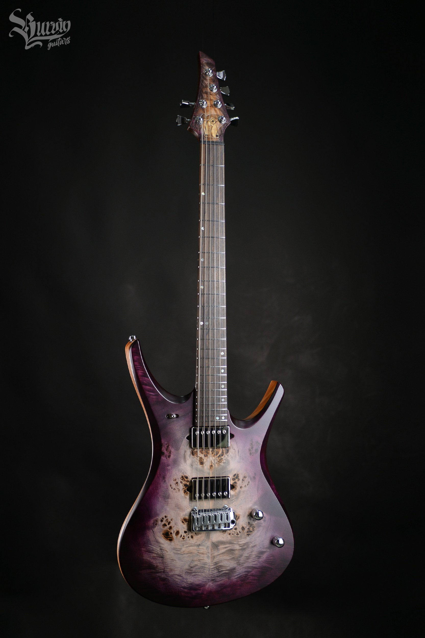 054 AXES. Master of making guitars and basses to order