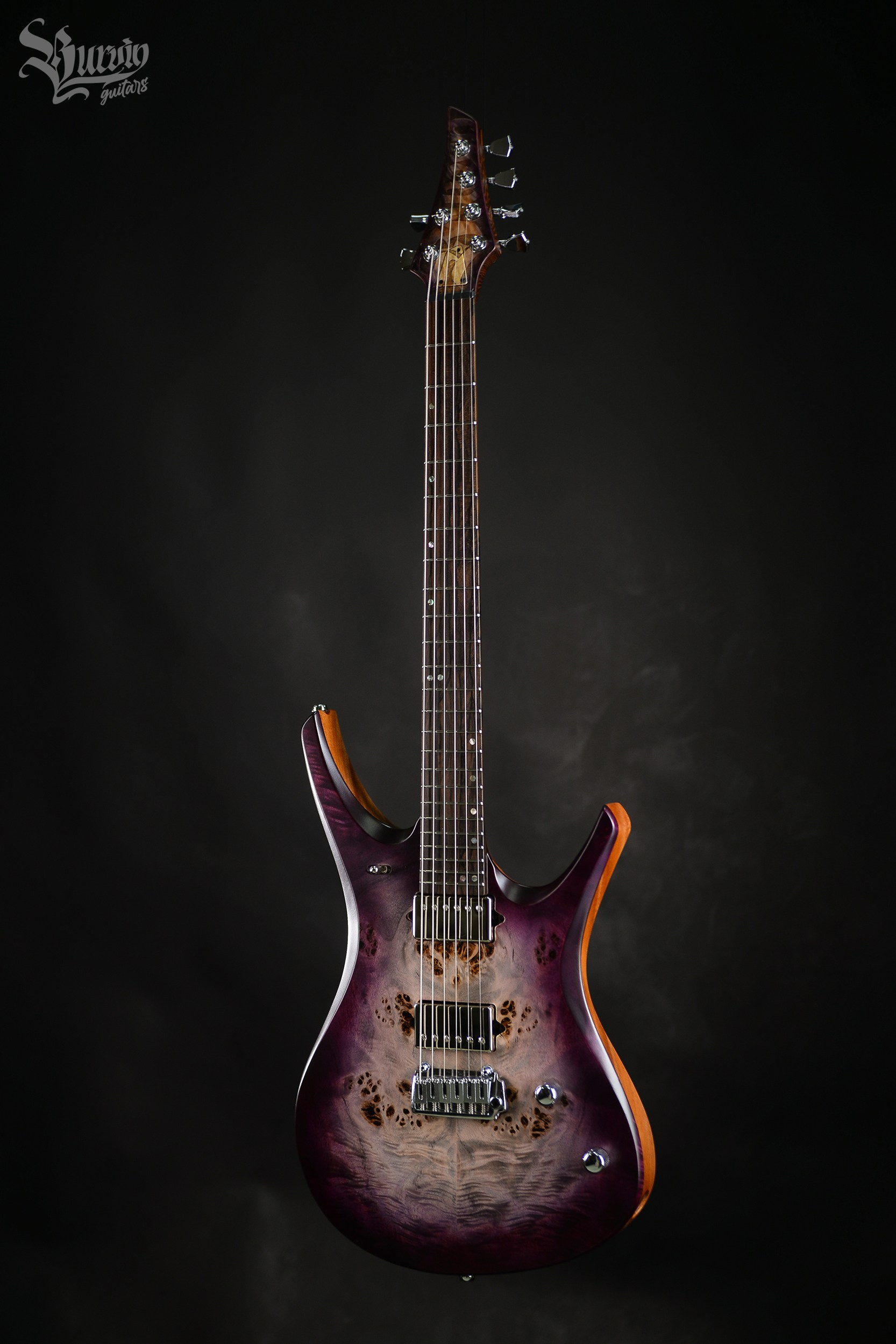 054 AXES. Master of making guitars and basses to order