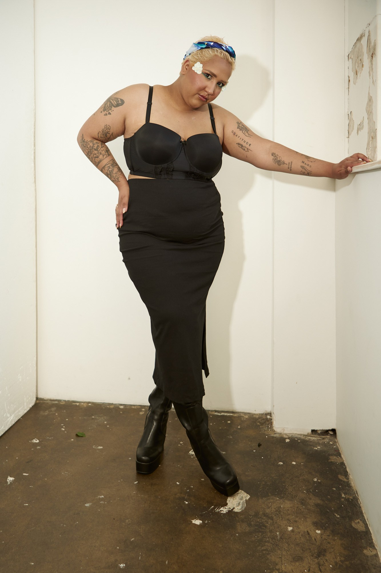 Full-length model portfolio portrait of Doriane Cannon in a black dress, photographed in Sydney by Maria Poleshchuk.