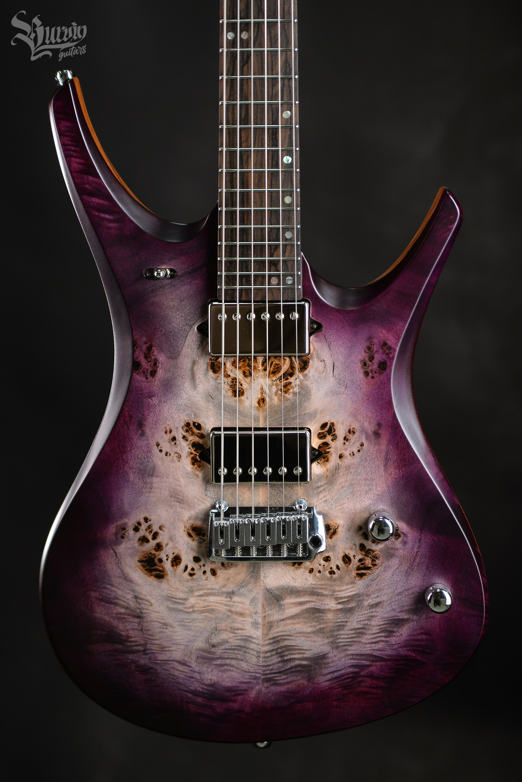 054 AXES. Master of making guitars and basses to order