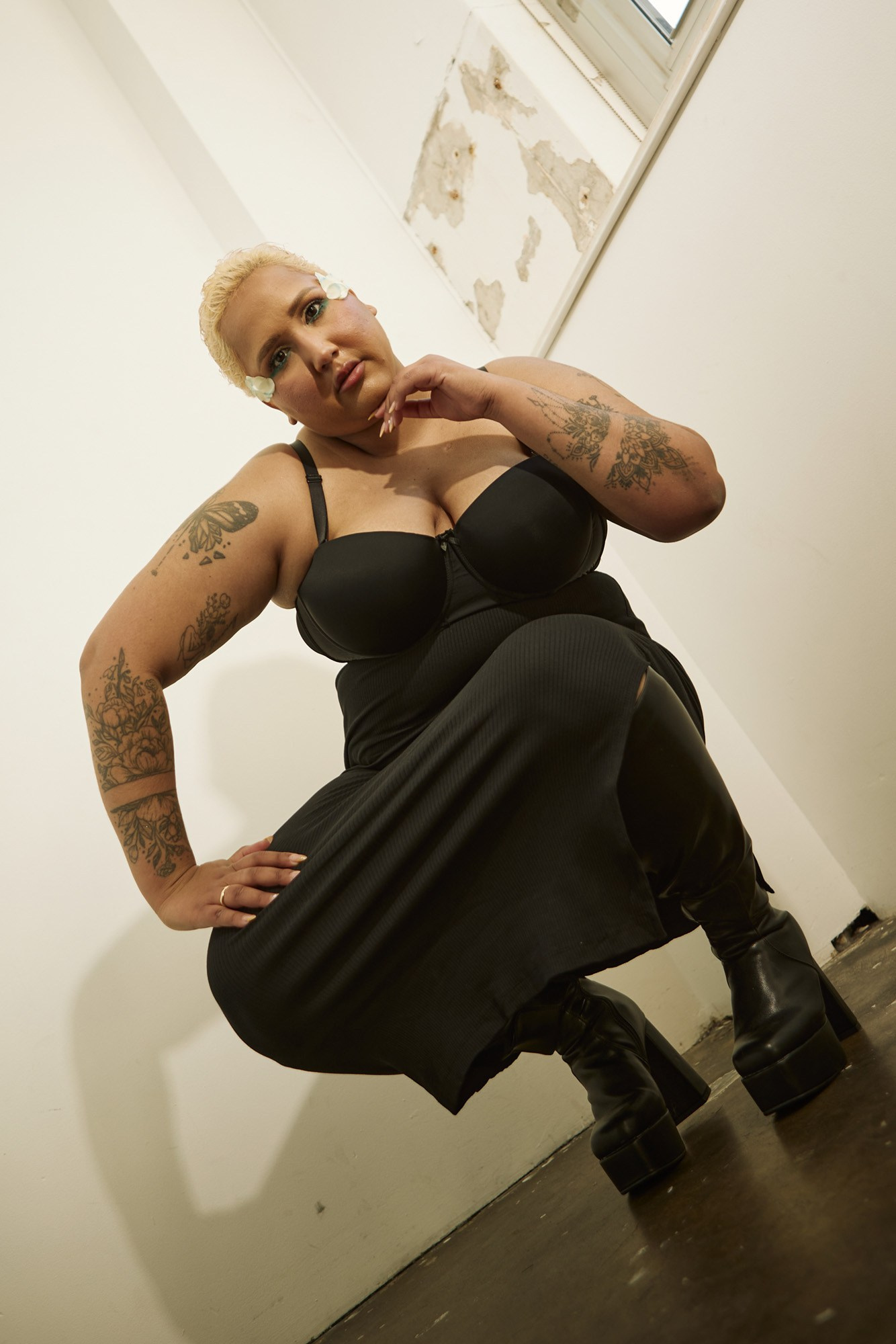 Doriane Cannon posing in a black dress during a professional model portfolio photoshoot in Sydney.