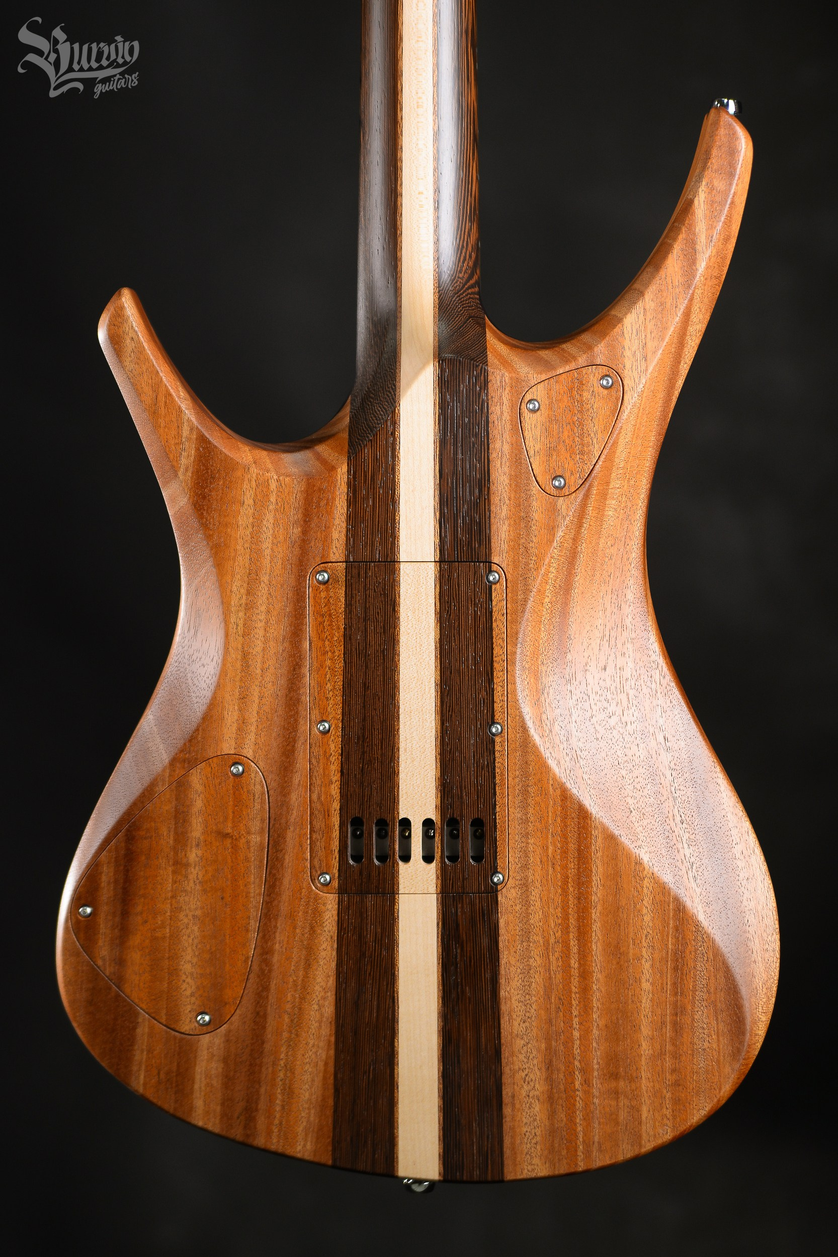 054 AXES. Master of making guitars and basses to order