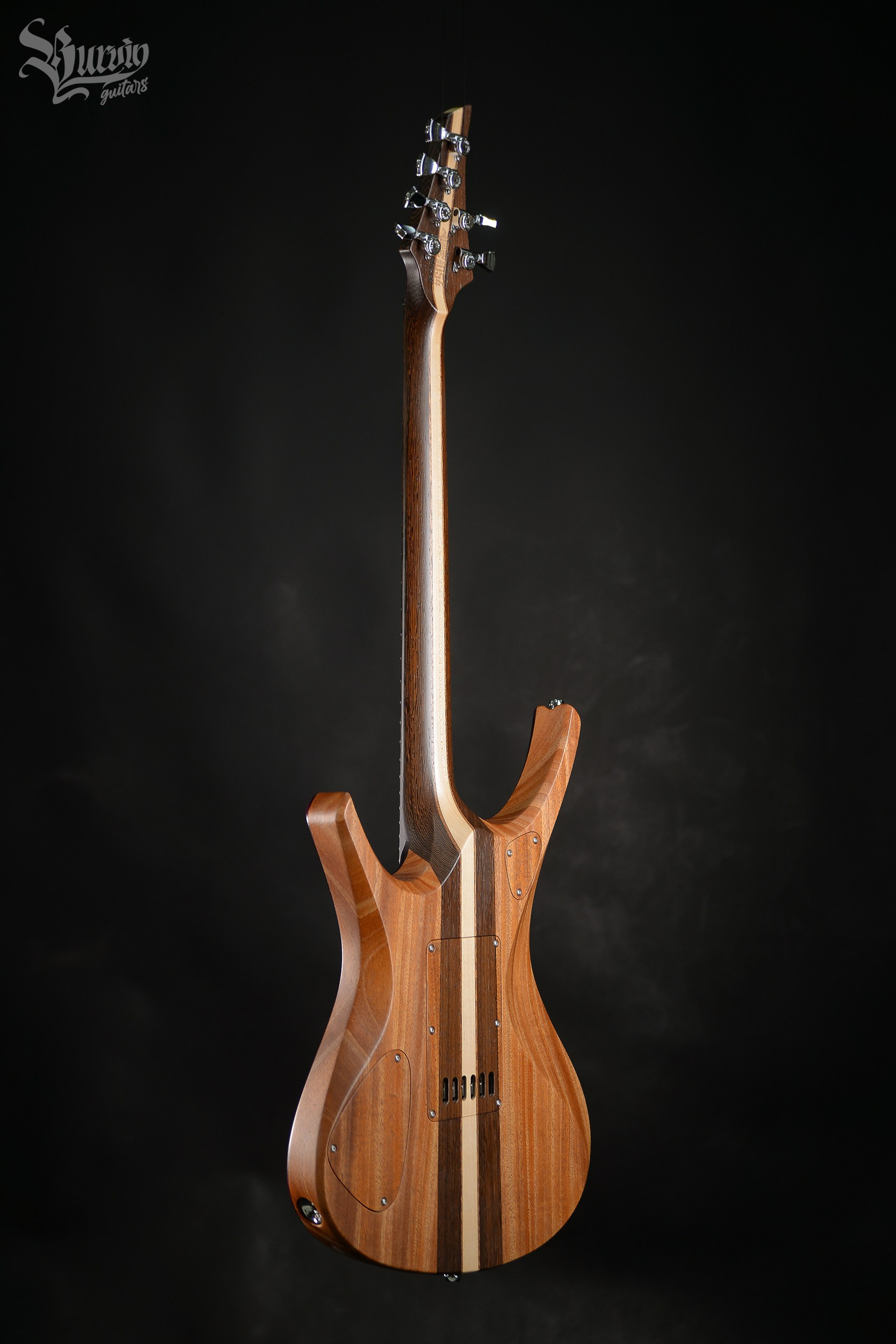 054 AXES. Master of making guitars and basses to order