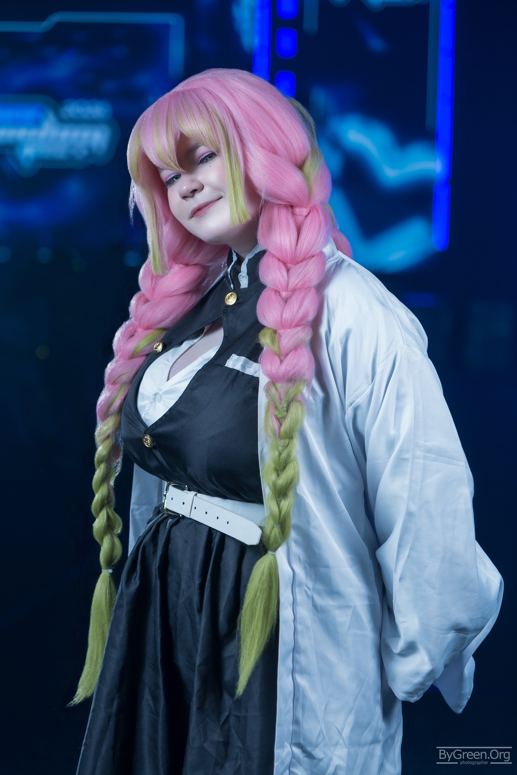 Cosplay of Mitsuri Kanroji from Demon Slayer — pink and green braids, portrait, Fandom Fest 2026, Moscow