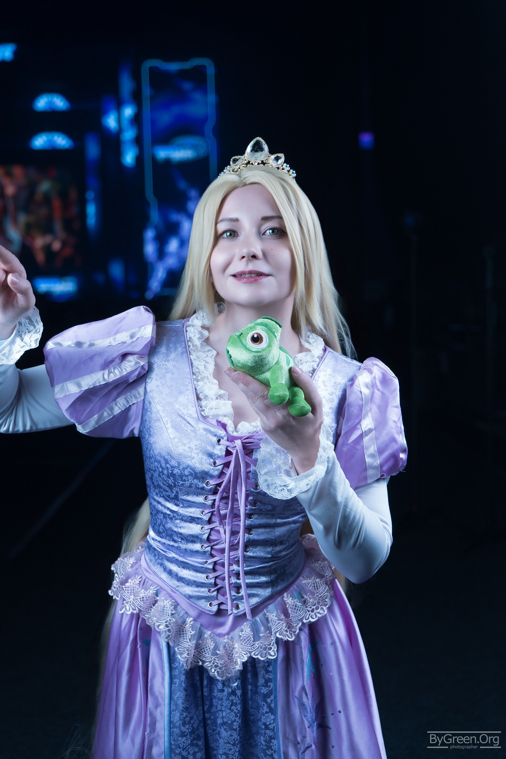 Cosplay of Rapunzel from Tangled — Pascal and long braid, Fandom Fest 2026, Moscow