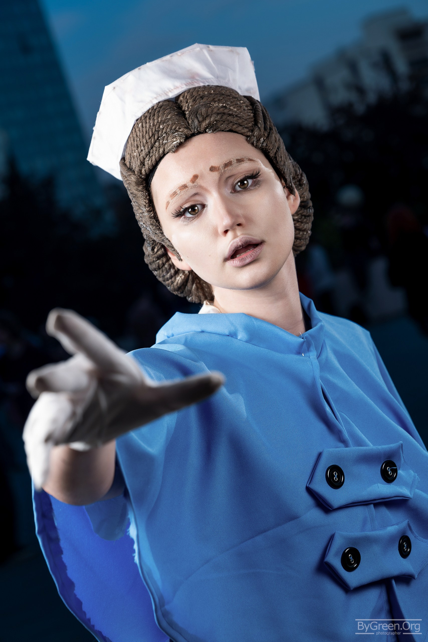Cosplay from Identity V — blue uniform, outstretched hand, VIBE.CON 2026, Moscow