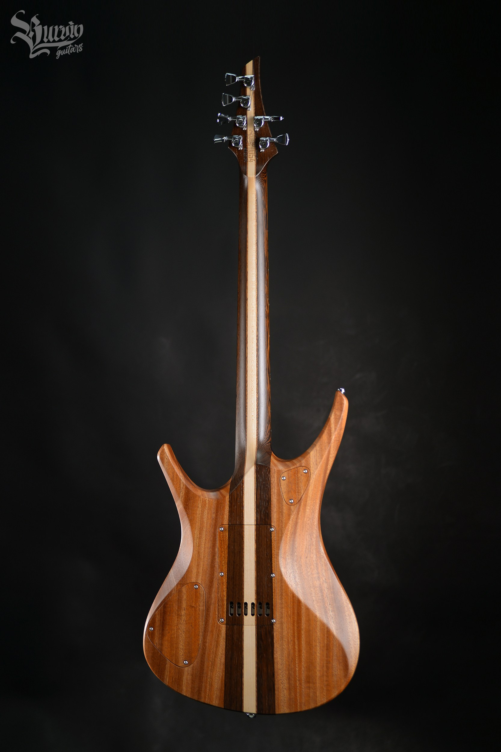 054 AXES. Master of making guitars and basses to order