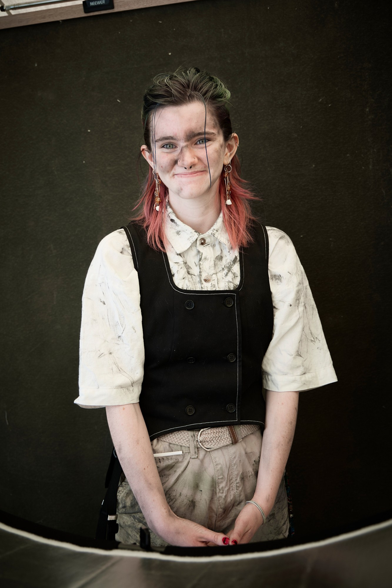 Steampunk festival costume portrait with vintage clothing and studio lighting