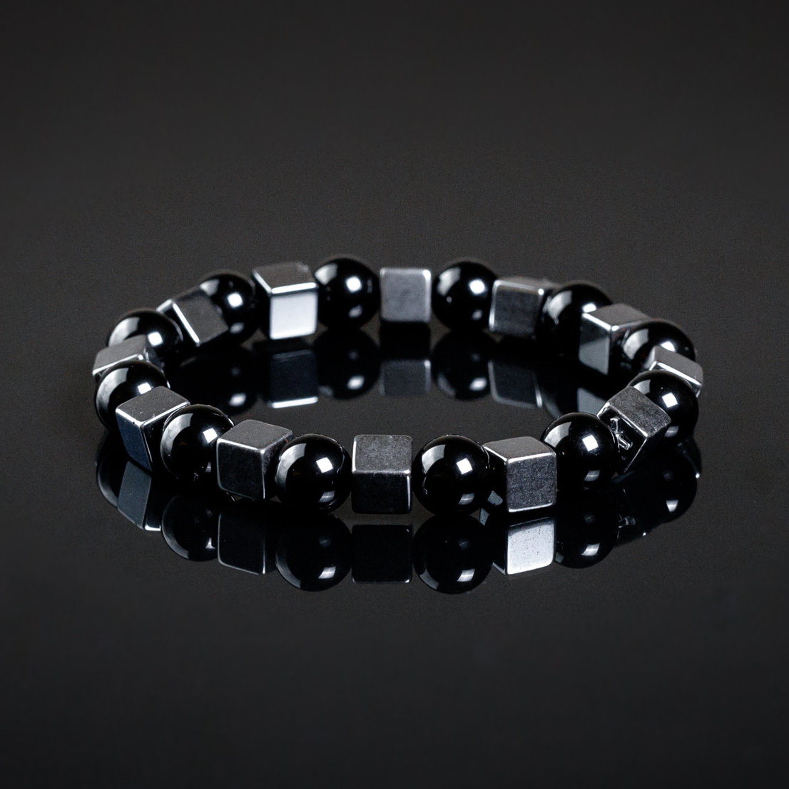 — из камней