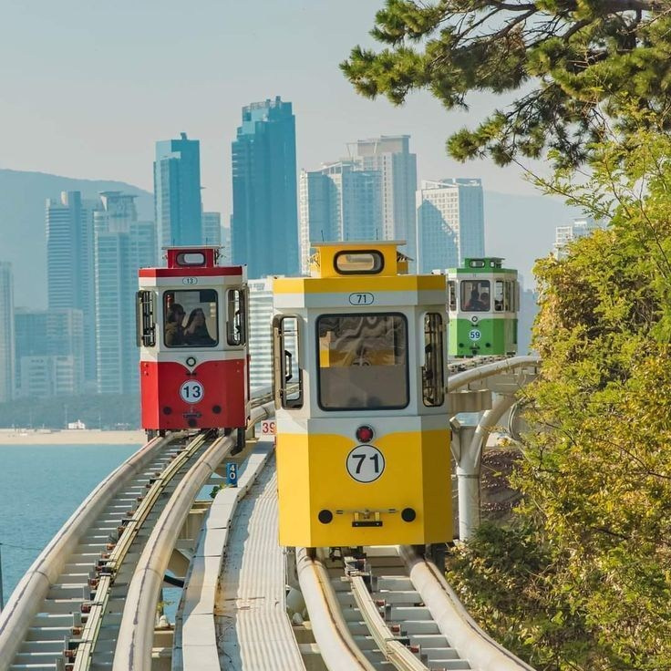 Haeundae Blue Line Park sky capsules against the skyscrapers, Busan · 釜山旅拍