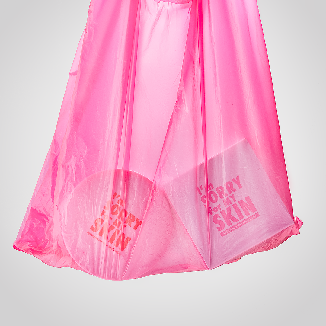 Крем и патчи для лица в розой упаковке и розовом полиэтиленовом пакете