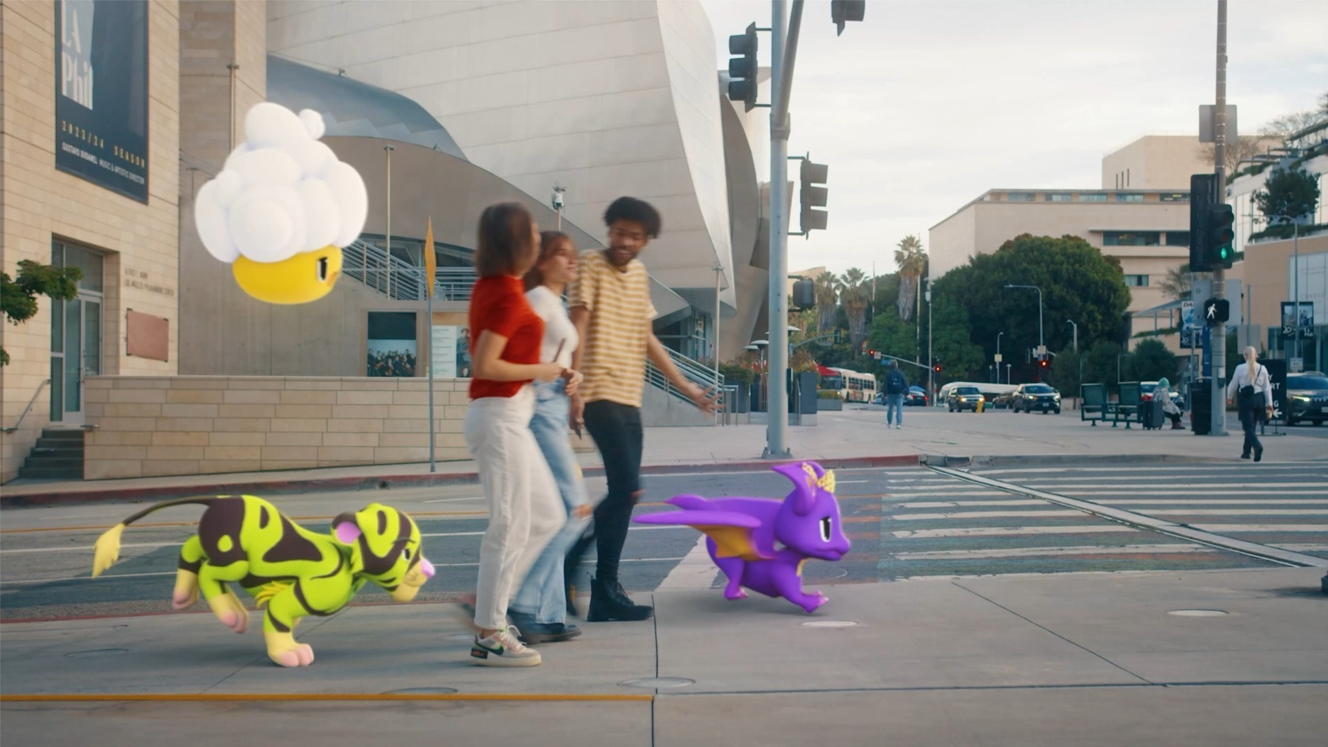 Friends walking in an urban setting with playful virtual characters, blending augmented reality and real-world interactions.