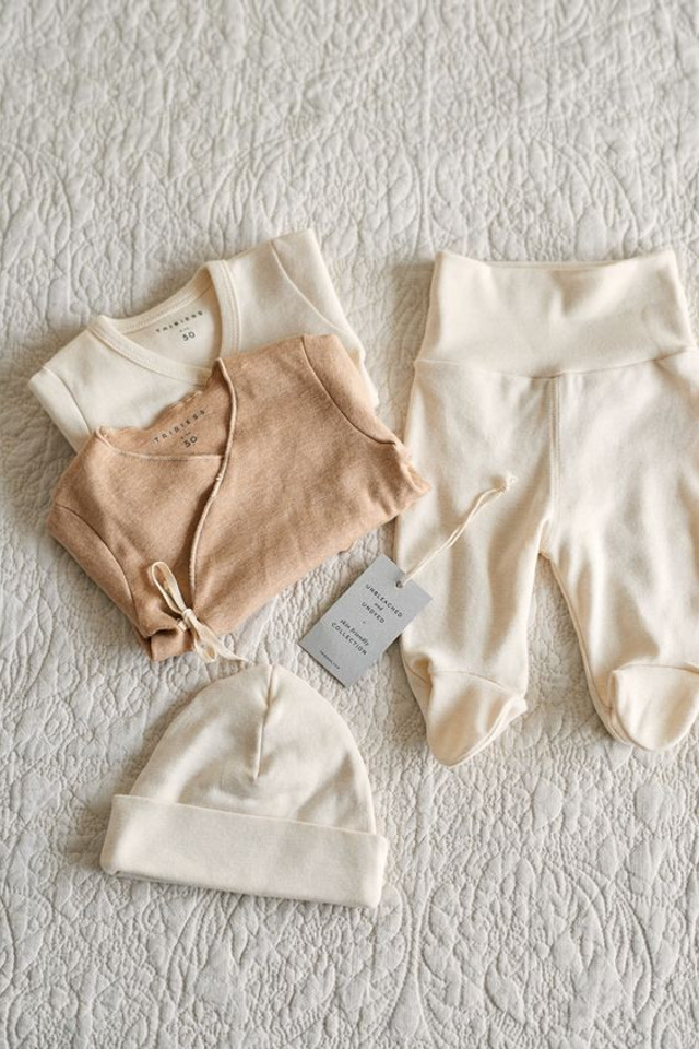 Качественная фотосъемка одежды для новорожденных для увеличения продаж