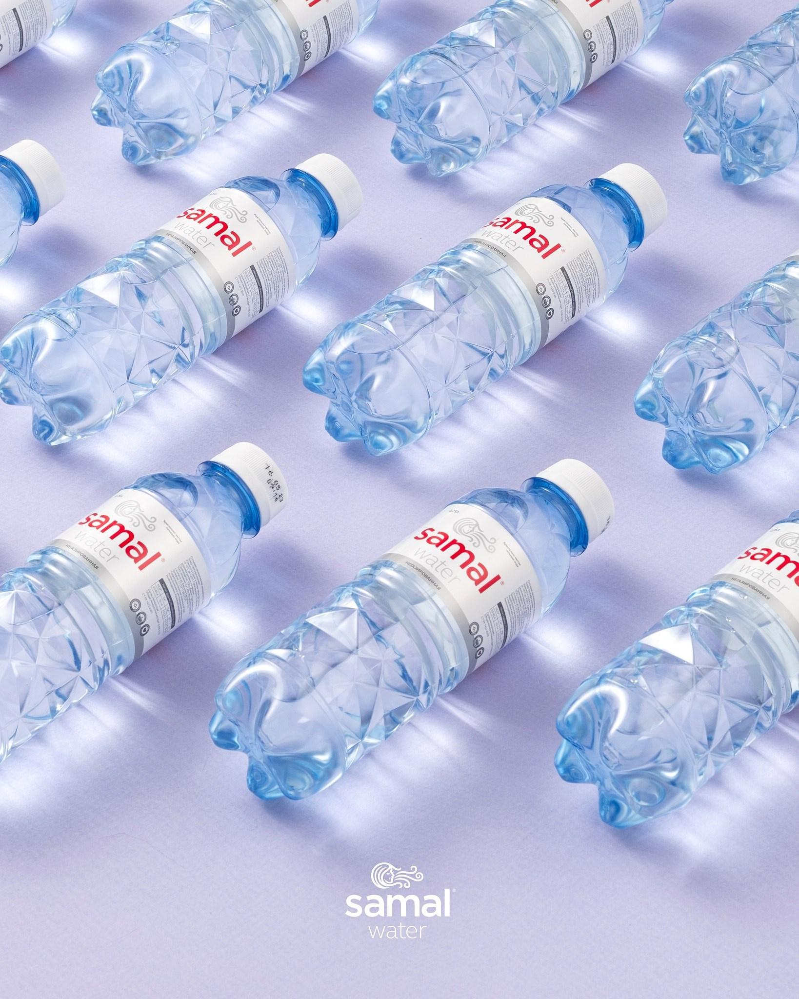 Контентная фотосъёмка бутылок Samal Water для бренда в Алматы