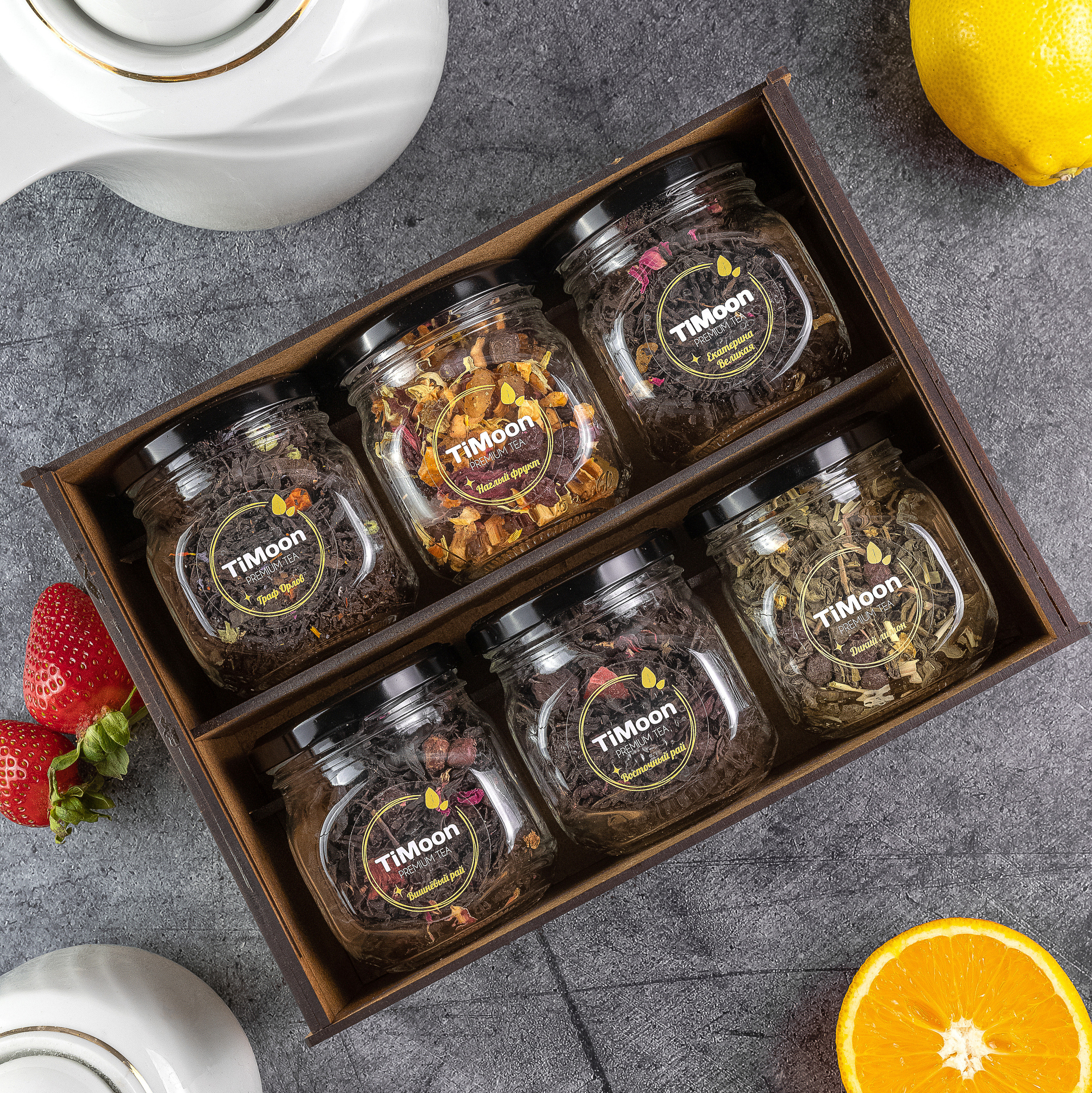 подарочный премиальный набор чая в деревянной коробке флетлей для вайлдберис на темном фоне